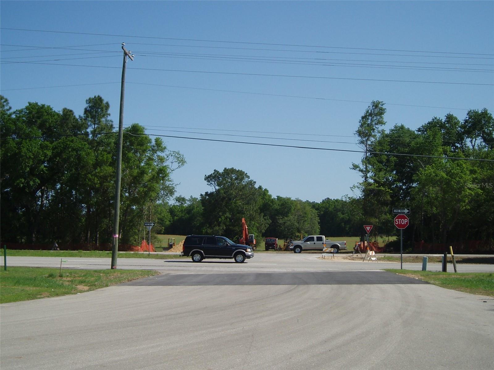 The site is a total of 52.68 +/- acres consisting of 3 parcels (18.28 acres zoned CI, 24.29 acres zoned ILW, 10.11 acres zoned I). Property may be divided into smaller parcels, pricing based on size/shape/frontage/etc. Property is in an excellent location within the City of Alachua, located between Gainesville and Alachua. It is located in the growing bioscience community, including Progress Park, Foundation Park and Copeland Park. FDOT approved driveway is in place including costly accel and decel lanes, resulting in signigicant development cost savings and access to the 18,000 vehicles that travel Hwy 441 daily. Site has sought after zonings in place (CI, I, ILW) with many development possibilities and much flexibility! Ideal for retail, office, industrial, manufacturing, and warehouse uses. Access to utilities is readily available.