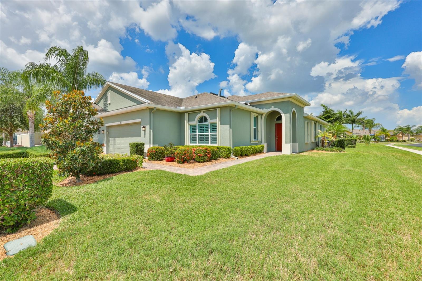 *CLICK ON 3D INTERACTIVE TOUR* -------- Welcome to carefree retirement living at its finest in the premier GATED 55+ community of VERONA in Sun City Center, FL.  This gorgeous, "LIKE NEW", 2 BEDROOM/2 BATH, PLUS DEN, VILLA boasts almost 1900 square feet of immaculate & perfectly maintained living space.  This home is situated on a LARGE CORNER LOT featuring a rich paver driveway & walkway and lush landscaping, giving this home amazing curb appeal.  Step inside and be wowed by the functional & spacious OPEN FLOORPLAN of this "SPRUCE" model.  This home has tons of natural light, elegant neutral decor, high tray ceilings, custom blinds & plantation shutters and nice ceramic tile flooring that's been recently cleaned & sealed.  The huge modern kitchen is a cook's dream with 42 inch wood cabinetry finished w/crown molding, stainless appliances including a NEW DISHWASHER, granite counters & glass tile backsplash and large breakfast bar for extra casual seating.  The comfortable living room/dining room combination is light & bright and has a slider leading to the lanai area.  The huge owner's suite at the rear of the home is your own private oasis with a luxurious ensuite bathroom w/double sink vanity, walk-in shower & terrific walk-in closet.  The spacious 2nd bedroom and full bathroom are at the opposite end of the home offering tons of privacy for guests.  The versatile 11 x 10 den is the perfect space for your office, hobby room or a 3rd bedroom if needed.  The extra large laundry room has more granite counters & cabinetry plus utility sink.  When you want to relax & unwind, retreat to the peaceful COVERED & SCREENED lanai.  This area is also "STORM SAFE" WITH MOTORIZED SHUTTERS.  If you want to sit poolside, you can enjoy the private neighborhood pool just up the street.  EXTRA UPGRADES ARE:  STORM SHUTTERS ALL AROUND, LVP FLOORING IN PRIMARY BEDROOM, INTERIOR PAINTING & EPOXY GARAGE FLOOR.  For an extra bonus, the new owners will receive a 1 YEAR HOME WARRANTY for worry fee living.  You'll also have access to the private Club Renaissance where you can enjoy dining, drinks, social activities, resort-style pool, spa, fitness classes and so much more.  So come and view this stunning home today and see why you'll want to call it yours!