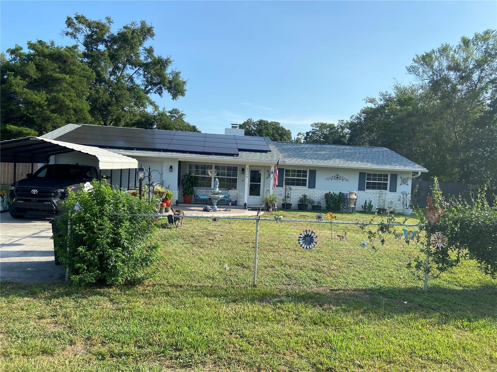 Beautifully updated 3BR / 2BA home in Fore Acres — move-in ready and thoughtfully upgraded throughout. 
Step inside to luxury vinyl plank flooring that flows seamlessly through the main living areas, creating a clean, modern backdrop. The expanded kitchen is a standout, featuring contemporary cabinetry, ample counter space, and brand-new stainless-steel appliances. A new washer and dryer are included for added convenience. The sunny dining room overlooks a charming stone fireplace in the adjoining living room, creating an inviting focal point for family meals and relaxed gatherings. 
All living spaces have been freshly painted inside and out, giving the home a bright, refreshing feel. Systems have been well maintained and recently updated: roof replacement in 2022, AC and water heater new in 2024, and septic professionally drained in 2023 — so you can move in with confidence. This gorgeous home has been upgraded with energy efficient solar panels. 
Outside, the yard is fully fenced and newly landscaped for low-maintenance curb appeal and privacy. A new storage shed offers extra space for tools and seasonal items, and the outdoor areas provide plenty of room for gardening, pets, or entertaining. 
Convenient, comfortable, and carefully maintained, this Fore Acres home blends modern updates with practical features. Contact us today to schedule a private showing and see everything it has to offer.