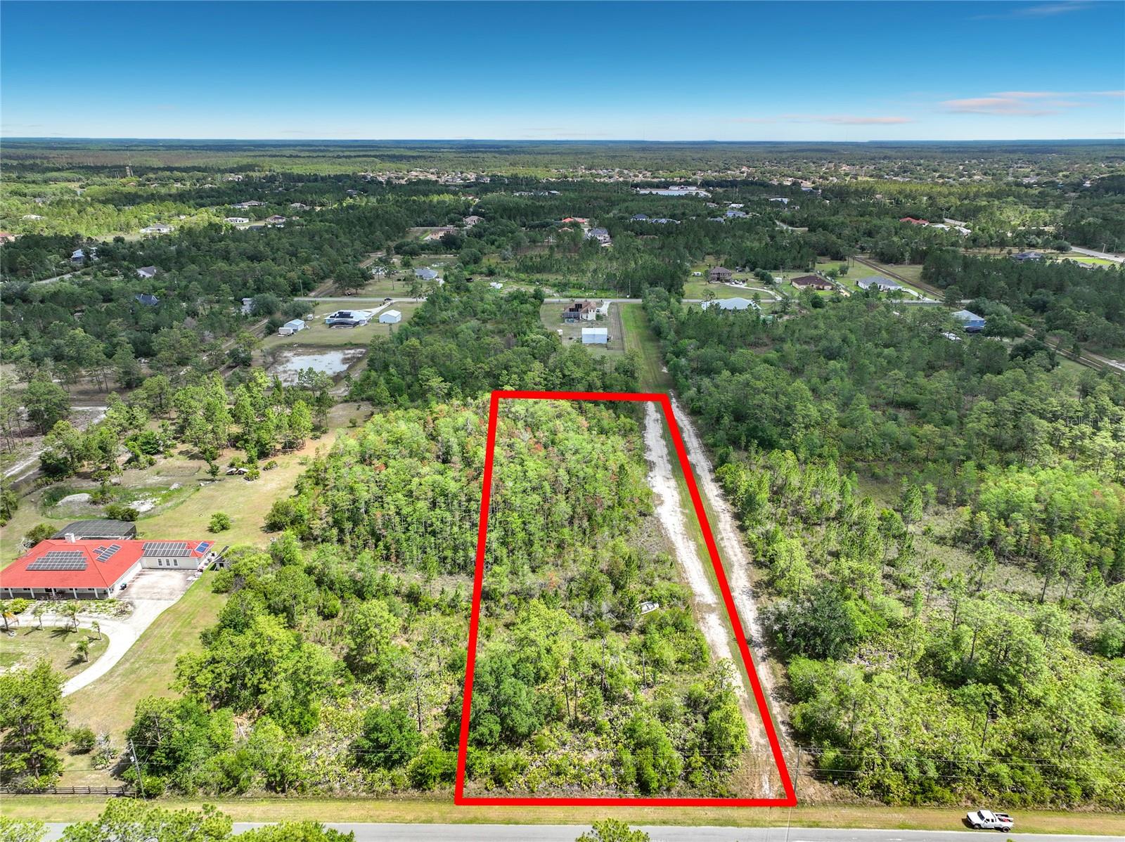 Build your dream home on this 2.06 acre buildable lot in Wedgefield, a desirable golf and equestrian community in East Orlando. Wedgefield (Cape Orlando Estates) offers an 18 hole golf course, clubhouse with restaurant, parks, playground, pickleball and basketball courts, dog park, and outdoor fitness area. Close to Hal Scott Regional Preserve, featuring thousands of acres of protected land with trails for hiking, biking, horseback riding, and fishing along the Econlockhatchee River. Easy access to SR 528 provides a convenient commute to Lake Nona, Medical City, Downtown Orlando, Orlando International Airport, and the Space Coast beaches. Great opportunity to build a custom home or invest in land with acreage in Orlando. Buyer to verify all information and conduct due diligence.