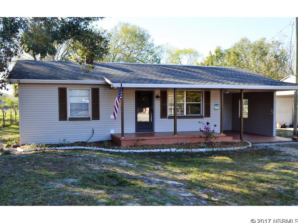 Don't miss out on this adorable 2 bedroom, 1.5 bath home. The home has been upgraded with new roof updated kitchen, new paint and new flooring. EZ maintenance exterior vinyl siding. tile flooring. This home has city water and septic system. Updated utility room with cabinets for storage. This is a squeaky-clean, move-in ready home perfect for a buyer obtaining financing, a second homeowner or an investment. Out in the country yet close to shopping, restaurants, beach, shopping and quick access to I-95. Square footage received from tax rolls. ;Water: City