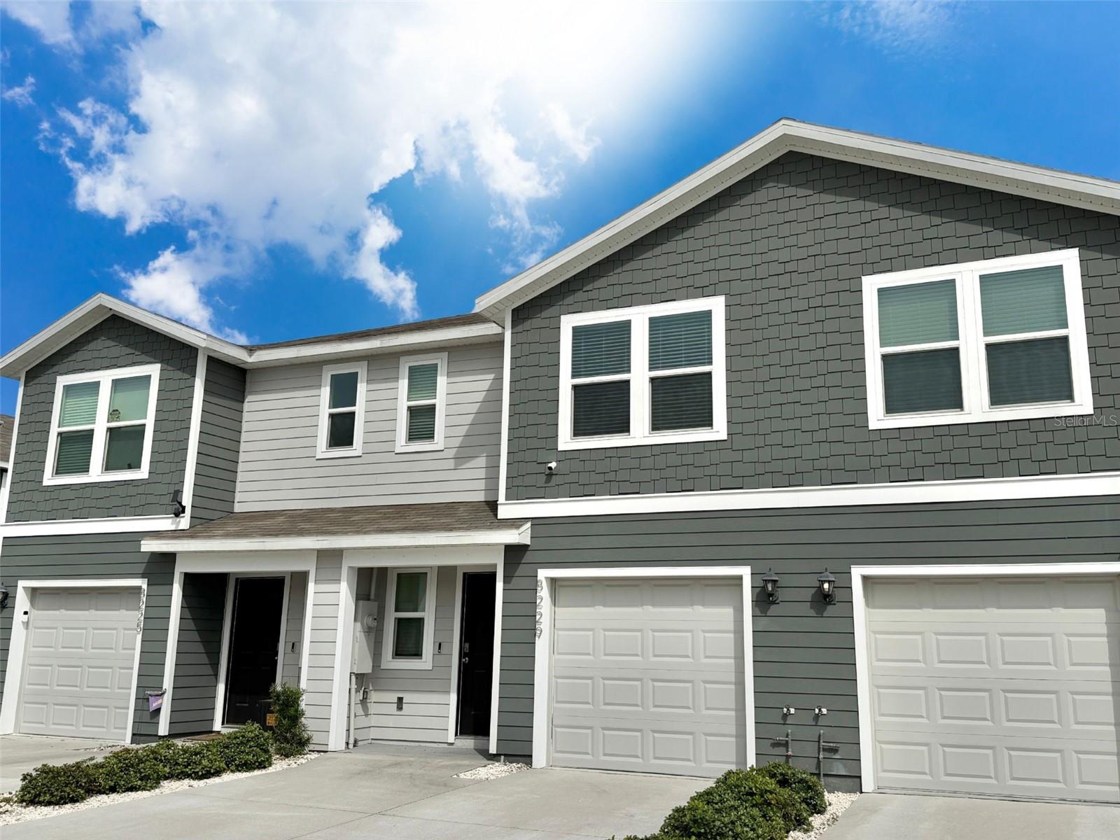Welcome to 8229 SW 67th Ave, a 2024 townhome located in The Towns at Laurel Commons. This 3 bedroom, 2.5 bathroom home features an open-concept floor plan with modern finishes and custom upgrades beyond standard builder-grade features.

Inside, the home offers a new kitchen backsplash, crown molding, cabinet molding, upgraded light fixtures, and ceiling fans. These custom additions create a more polished, elevated feel while maintaining a functional layout for everyday living and entertaining.

The rear of the property overlooks green space, offering a more open backdrop with no immediate rear neighbor. This setting provides added visual space and a peaceful outdoor view.

Additional features include a one-car garage and exterior parking for two vehicles, providing convenient parking options for residents and guests.

Located near SW College Road/Highway 200, the property offers access to nearby shopping, dining, entertainment, everyday services, and I-75.

Move-in ready and well-positioned within Laurel Commons, this townhome offers modern construction, custom upgrades, and a convenient Ocala location.