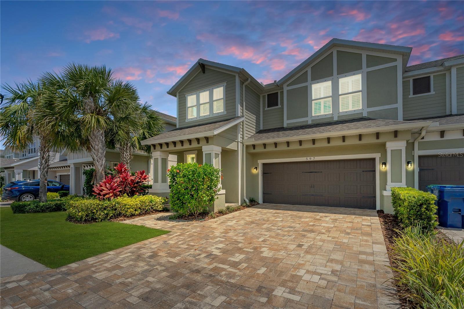 Welcome to this beautifully maintained 3 bedroom, 3.5 bath townhome in the highly desirable coastal community of Ozona. Built in 2019, this 2,324 square foot home offers modern construction, thoughtful upgrades, and a prime location just blocks from the water while remaining in a high and dry, non flood zone with no damage from any previous hurricanes.

Inside, you'll find an open floor plan with high ceilings, luxury vinyl plank flooring, crown molding, plantation shutters, and abundant natural light from clerestory windows in the foyer. The kitchen features quartz countertops, solid wood cabinetry, an extended island, upgraded appliances, a custom walk in pantry, and a beautiful tile backsplash. The living area opens to a covered brick paver lanai with a pull down sunshade, creating a comfortable outdoor living space.

All three bedrooms are ensuite, offering privacy and flexibility. The spacious primary suite features tray ceilings, a beautifully updated bathroom with dual vanities and a walk in shower. A convenient builder upgraded half bath is located on the main floor.

Additional highlights include fully paid off solar panels, reducing the electric bill to approximately $30 per month and saving over $12,000 in energy costs since 2021, a whole home water filtration system, and an A/C system with UV lights.

The community offers a pool, cabana, showers, and restrooms and is located directly next to the 47-mile Pinellas Trail. Walk or golf cart to Ozona's restaurants, shops, taverns, and live music, or enjoy a short ride to Downtown Palm Harbor, Downtown Dunedin, and the Tarpon Springs Sponge Docks. Nearby marinas, top rated golf courses including Innisbrook Resort, and highly rated schools, this home and location really has it all!