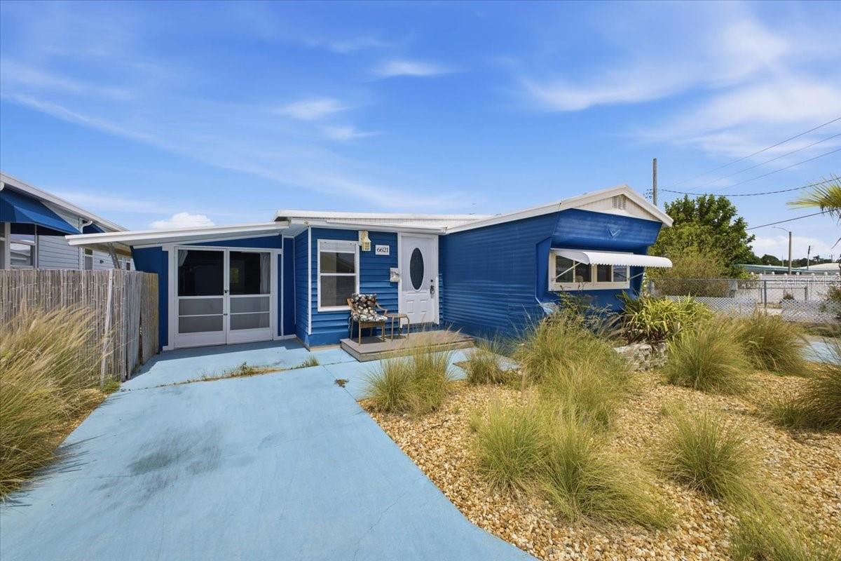 Welcome to this absolutely stunning home in Trailer Estates!! Home has 2 bedrooms and 1full bathroom. Home is in excellent shape and has been meticulously maintained! Home Also sits on one of the largest double wide lots in the community boasting well over 4,000 sqft of your own land. The property's exterior has been significantly upgraded, including a large outdoor wooden deck with its own outdoor shower, and outdoor eating area/bar, and its own sink with running water. Property has a carport as well as a large outdoor space. Property also has 3 mini A/C splitters, keeping the home cool year around. Home also features a large shed/workstation which can also be reimagined and used as you wish. FULL 3D walk-through video available upon request. PLEASE NOTE I AM NOT AVAILABLE ON THE SABBATH/SATURDAY.
