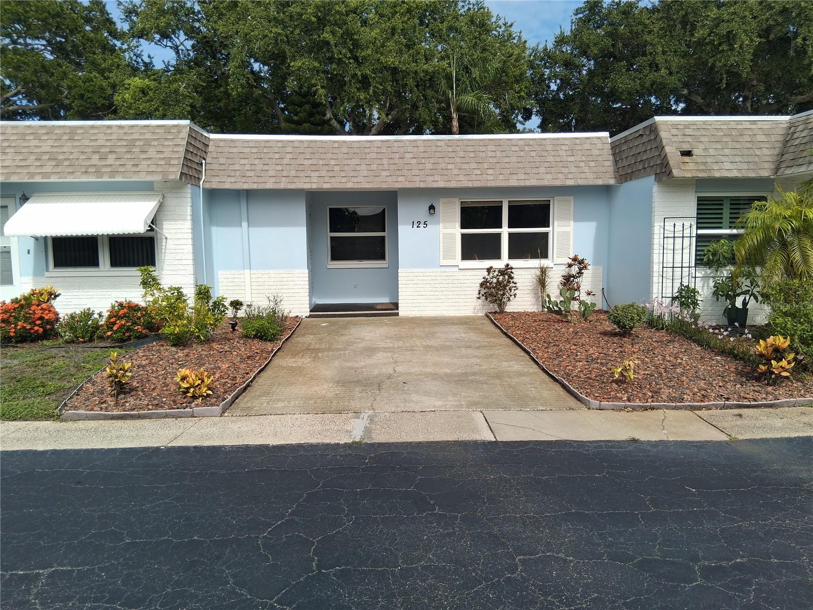 Location, Location, Location! Very quiet Skye Loch Villas is one of the best kept secrets in Dunedin Florida. This solid block 686 square foot villa offers 1 bedroom 1 bathroom plus a 12' x 17' bonus room in the rear. The bedroom has a large closet. Kitchen has been updated with new countertop with back splash and new garbage disposal, bathroom has updated walk-in shower. New TPO roof in January 2026. Drive your golf cart to downtown Dunedin, only 1 mile away. Skye Loch Villas is a 55+ community. Clubhouse offers a kitchen and library, community heated pool, shuffleboard, etc. Close to downtown Dunedin, Honeymoon Island, Clearwater Beach, Toronto Blue Jays stadium, The 75 mile Pinellas Trail etc. The Historic Fenway Hotel is a mile away, perfect for your out of town guests. Close to Dunedin Marina, where you can put your kayak into the Gulf of America, with many islands to discover. Low HOA fees of $320.00 includes water, sewer, trash, Spectrum internet and Platinum TV cable including Disney+Basic plus Peacock Premium, Spectrum TV includes access to popular streaming apps at no extra cost, in addition to 150+ channels, lawn care, & exterior paint. With no land lease or flood zone, Skye Loch is a very desirable community. This X flood zone villa had no damage from any past hurricanes or storms it is high and dry. 30 minutes to Tampa International Airport. 45 minutes to Tampa Cruise Port. Golf cart, bicycle or walk to Historic Downtown Dunedin Florida. Come live in Skye Loch Villas and enjoy all Dunedin has to offer, live where most people come to vacation.