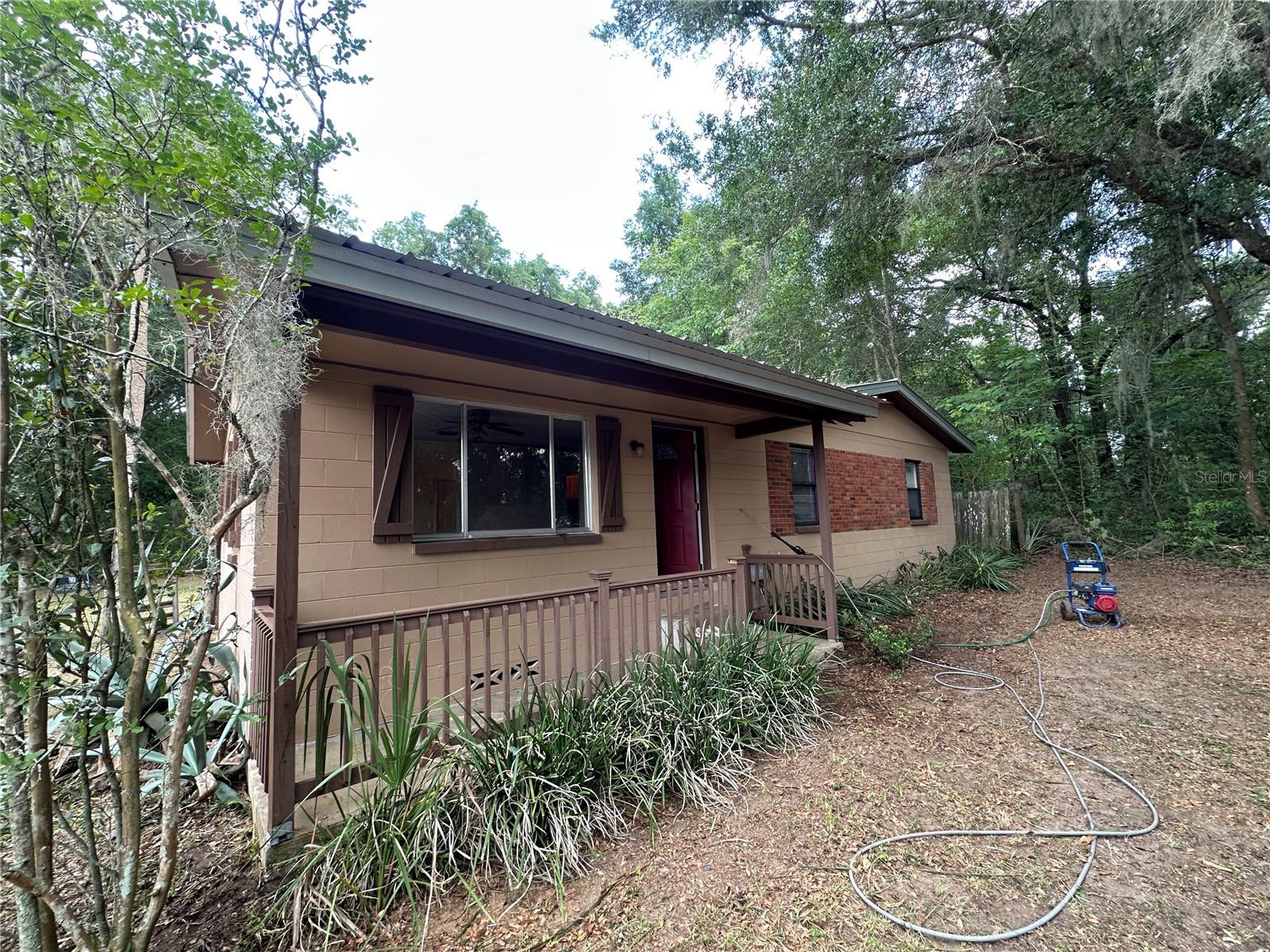 An affordable opportunity awaits block home on just under a half-acre in Citra. This 3-bedroom, 1-bathroom home features a newer roof and newer central air system. This home is ideal for a first-time homebuyer or an investor looking for a property with significant potential. With some cosmetic upgrades, this property can be transformed into a true standout. The layout provides a solid foundation, and the surrounding neighborhood supports both long-term value and rental demand making it an excellent opportunity for buyers looking to add value and build equity. This property is being sold in its current condition, however, for buyers looking to maximize their investment from day one, the Seller has made available an alternative purchase price of $130,000, which includes a full bathroom renovation completed prior to closing.