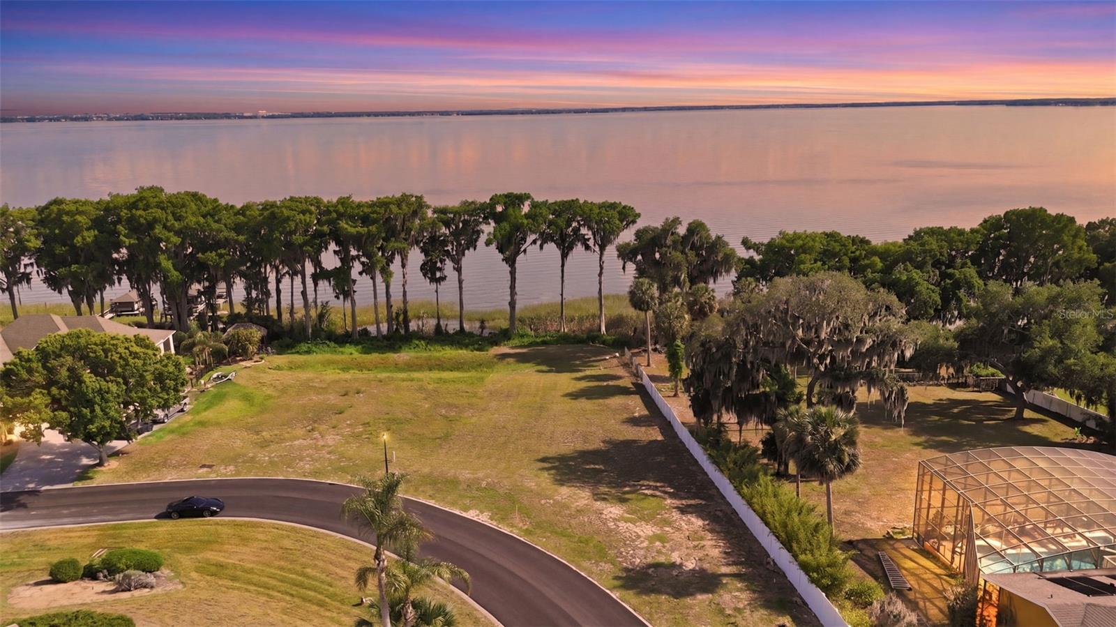 This isn’t just another waterfront lot with the same recycled “paradise awaits” description. This is one of those properties where you can actually picture the life that comes with it.

Build your dream home right on Lake Eustis with direct access to the entire Harris Chain of Lakes — where boat days turn into waterfront dinners, sunset cruises become part of your routine, and weekends feel different out here.

The lot gives you the freedom to create something custom instead of settling for somebody else’s idea of lake living. Plenty of room to design the kind of home that fits the way you actually want to live — whether that’s quiet mornings on the dock, entertaining friends by the water, or simply having the view you’ve worked hard for.

Good waterfront is getting harder to find, especially on the Chain. Once you stand out here, you’ll understand why buyers wait for properties like this.