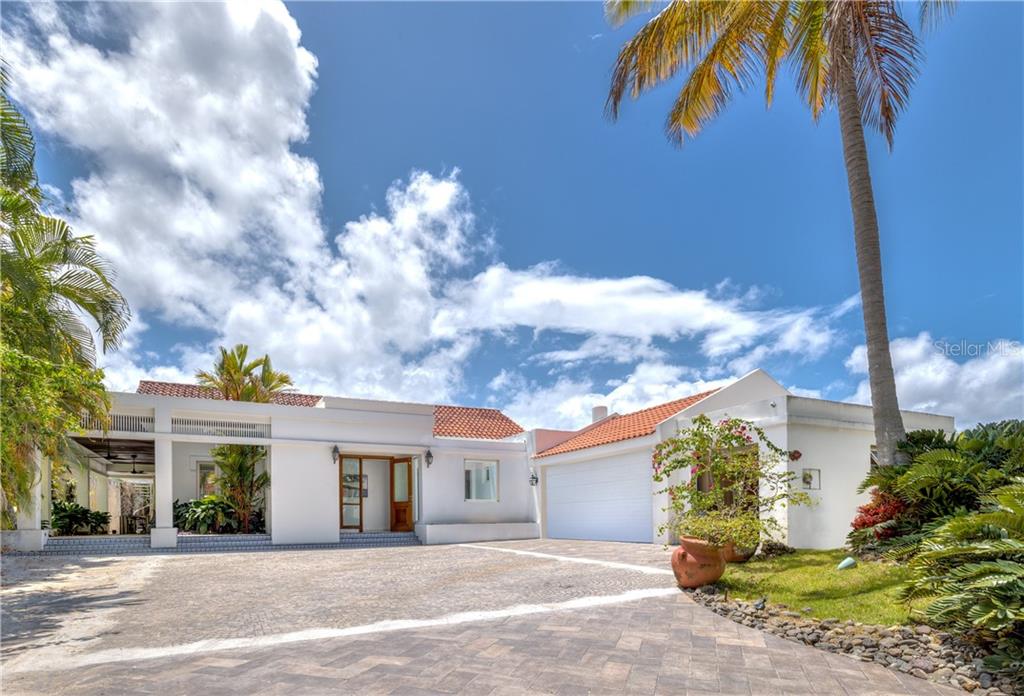 Rare to market Dorado Beach East opportunity.

Single story ranch layout, with construction 85% completed in a beautiful head to toe redesign, with the final work to be carefully selected for the discerning buyer. An infinite amount of tireless detail has gone into the spaces which have been completed, affording the new owners the benefits of short-term details, to complete this truly unique Dorado Beach East home. With just over a quarter acre, 357 Dorado Beach East offers southern exposure on its corner end lot, with mountain views from the rooftop deck, and only three homes off the main golf course and lake.

An elegant grand entry seamlessly draws you into this 5 Bed plus maid's quarters, 6.5 bath spread throughout a gracious 4,000 sq.ft of interior living and 1,500 sq.ft of outdoor dining, entertaining and sunning areas. The meticulously designed master suite located off of the sun filled garden inspired loggia, offers white Spanish marble flooring throughout as well as full marble bath with outdoor tub and shower, Samuel Heath fixtures, walk-in closet and custom mahogany reinforced doors and windows. The adjoining guest bedroom mimics the expression of the master, with full floor to ceiling windows, white marble flooring and mahogany doors, to suit. 

All guest bedrooms feature private ensuite bathrooms and have been fully completed in their renovation, each offering a separate elegance of design, easily appreciated by all who experience the space. The living, dining and kitchen all open out via sliding glass doors which neatly pocket to provide the true benefit of Caribbean living. Seamlessly bringing the outdoors in, the beautiful inground outdoor pool offers a zero, sunset edge, with elevated spa for design impact. Full bar and summer kitchen islet for the incoming new owner to customize to taste, outdoor dining and rooftop terrace facing Southeast. A truly refreshing layout that provides privacy throughout, while maximizing open, entertaining and family spaces.

Very few opportunities such as this present themselves in Dorado Beach East, with the freedom to come and finish work and detail, on this, a definable and one of a kind family home.

Monthly Maintenance Fee: $750.