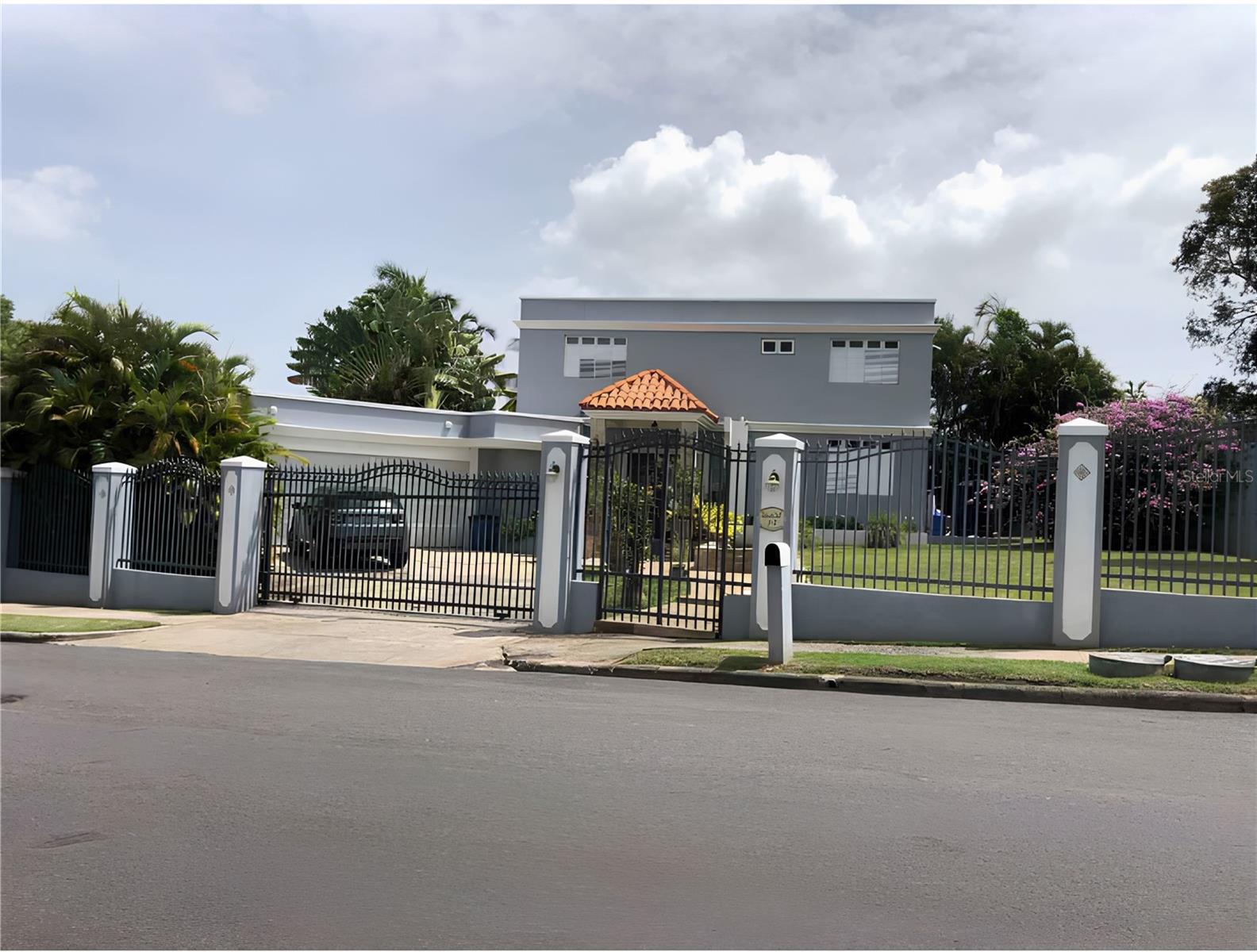Experience refined living in one of the most recognized and sought-after gated communities in Guaynabo. Located within the exclusive Torrimar Alto neighborhood, this elegant residence offers the perfect combination of space, comfort, privacy, security, and peace of mind.

Thoughtfully designed for modern family living, the home features 5 spacious bedrooms, 4.5 bathrooms, and a generous family room, providing the ideal setting for entertaining, relaxing, and creating lasting memories.

The property's functional layout offers ample living spaces filled with natural light, creating a warm and inviting atmosphere throughout. In addition, the residence is equipped with a full-power backup generator and a water cistern, ensuring uninterrupted comfort and convenience year-round.

Residents enjoy the peace of mind of living in a community with 24/7 gated security and controlled access, offering both privacy and exclusivity.

Property Highlights

• 5 Bedrooms
• Swimming pool
• 2 spacious and beautiful terraces
• 4.5 Bathrooms
• Spacious Family Room
• Full-Power Backup Generator
• Water Cistern
• 24/7 Gated Security
• Located in the exclusive Torrimar Alto community
• HOA: $140/month
• Prime location in Guaynabo

Torrimar Alto is renowned for its central location and exceptional quality of life, offering easy access to top-rated schools, fine dining, shopping centers, healthcare facilities, and major highways throughout the metropolitan area.

This is a rare opportunity to own a distinguished residence in one of Puerto Rico’s most desirable communities, where luxury, security, convenience, and preparedness come together seamlessly.

Schedule your private showing today and discover the lifestyle that awaits at Torrimar Alto.