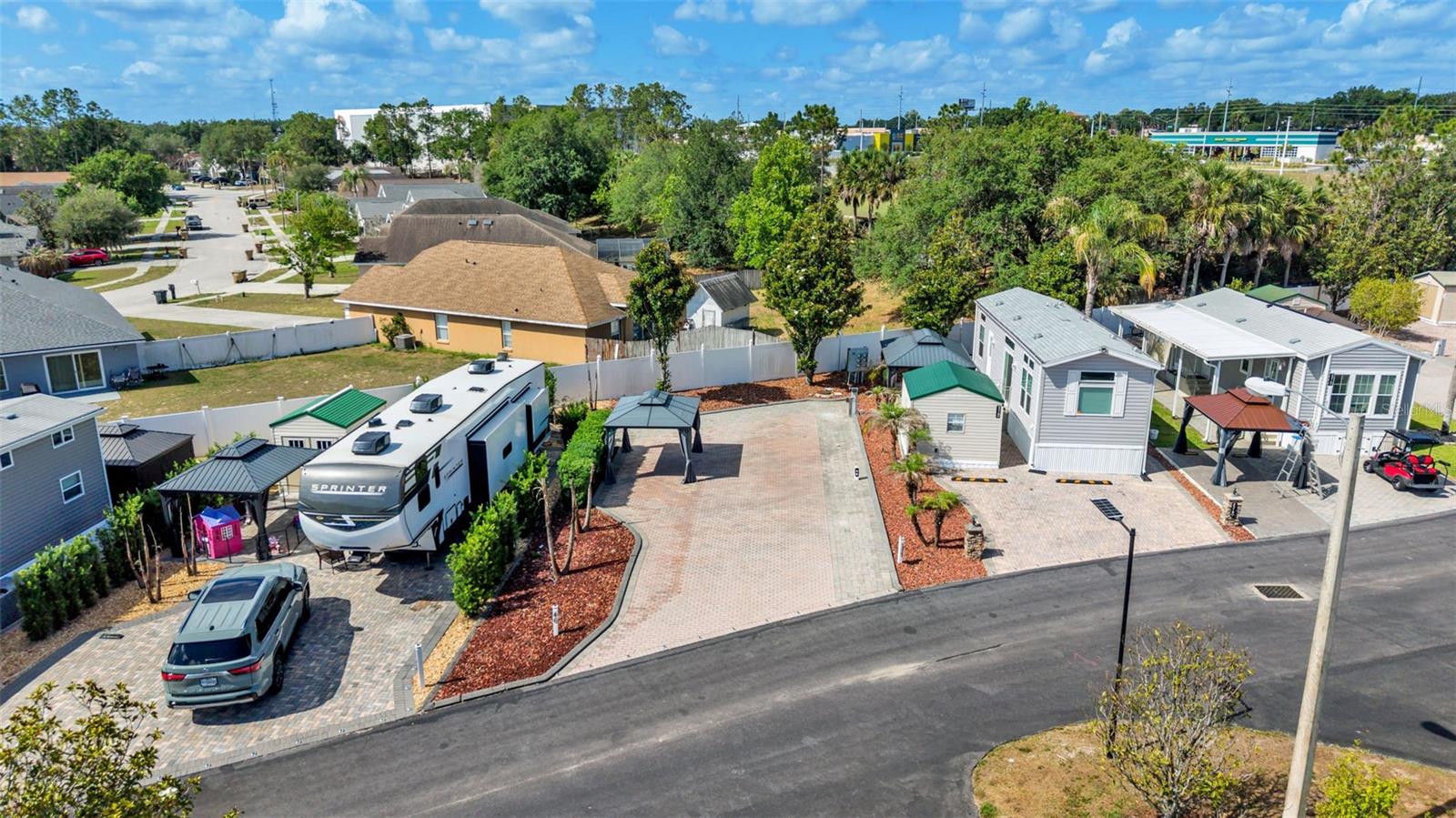 Low-maintenance living in the Florida Sunshine on your own perimeter RV pad in Elite Resorts at Citrus Valley! This popular community is located in Clermont, close to Disney (12 miles) and many Central Florida Attractions. Park and enjoy on an oversized paver pad, with parking area and gazebo. You'll have plenty of room for any size RV with 50 amp electrical service, water supply and sewer services on charming Limewood Avenue. The community amenities are a big value with high speed internet, cable, sewer, trash, water, grounds maintenance, community pool, bathhouses, playground, gate, grass cutting and more included in your condo dues ($786 each quarter). Plus enjoy social events, beautiful weather, Bingo and many nearby attractions as part of the Florida lifestyle. Call today to set up your showing!