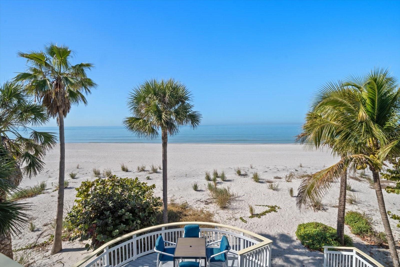 THE LOWEST PRICED BEACH FRONT LOT ON SUNSET BEACH. BUY NOW, BUILD LATER!!!  SECURE YOUR BEACHFRONT LOT ON SUNSET BEACH TODAY! Ready to exchange snowdrifts for sand dunes & coconut palms? This Elevated Beach House has amazing Beach views & an incredible location, directly on the sand on the Gulf of Mexico. Located in the eclectic neighborhood of Sunset Beach.  Feel the Boho Vibes with artistic accents, white washed walls & bamboo floors.  This well-maintained beach house has an open floor plan throughout to invite the water views inside. A gleaming kitchen with solid wood cabinets, cooking island, breakfast bar & pantry. The main level bathroom adorned with a mesmerizing floor to ceiling mural entitled Mermaid Dreams.  Each bedroom has vaulted ceilings & an ensuite bathroom.  A private balcony completes the owner’s suite. The second living room could easily be converted into an additional bedroom if needed. If you were made for outdoor beach living, this house was made for you.  Love was poured into the multi-level circular decks & grand staircase which pull you towards the white sands and turquoise waters of the Gulf. Come to Sunset Beach where the Sunset is celebrated daily, your sunglasses are your most important accessory & your neighbors become your friends.  A freshly Re-nourished beach awaits your arrival. Feature sheet, operating expenses, Survey, elevation certificate & aerial video available on the virtual tour.