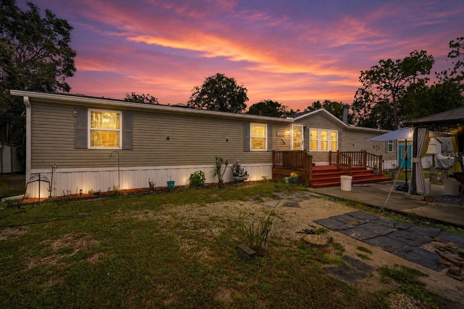 Home is where memories are made and that is exactly what you’ll find at 825 N Griffith Ave Crystal River, FL.
Situated on a spacious half-acre lot, this 5-bedroom home plus flex space and 3 bathrooms offers the perfect blend of comfort, space, and functionality.  The current owners have done the hard work for you, just pack your bags and bring the toys!
Step inside to the inviting living room featuring a beautiful stone fireplace.  The dining room seamlessly connects the living area to the upgraded kitchen, making it ideal for entertaining family and friends.  The kitchen offers ample cabinet and counter space, a center island, and upgraded appliances.
The primary suite includes an additional sitting area, perfect for a nursery, home office, reading nook, or extra storage space.  The en-suite bathroom has been thoughtfully updated and features a relaxing soaking tub along with a separate walk-in shower.
On the opposite side of the home, you’ll find four additional bedrooms, offering added privacy and flexibility.  All bedrooms are generously sized with ample closet space.  One of the bedrooms also features a private entrance to the backyard, making it an ideal setup for an in-law suite, guest quarters, or potential rental opportunity.  Across the hall, there is a fully updated mobility-friendly bathroom complete with a walk-in shower.
When your tour of the inside is complete, step outside and discover your own private backyard oasis.  This outdoor space features a spacious back deck with a professionally installed Mr. Pool pool, patio area, and firepit, perfect for entertaining or relaxing evenings at home.  The fully fenced yard is beautifully landscaped with a variety of trees and plants, including several fruit trees, creating a peaceful and private setting.
The garage is currently being used as a hangout space and has been insulated, offering endless possibilities for a game room, workshop, gym, or hobby area. An additional storage shed adds even more convenience and functionality to the property. For RV owners or guests, the property also includes a dedicated 30-amp RV hookup, making it easy to accommodate recreational vehicles with power access right on site.
Nature lovers will appreciate the abundance of wildlife that visits the property.  The current owner regularly enjoys sightings of hummingbirds, cardinals, and many other bird species, creating a serene retreat where you can relax and enjoy Florida's natural beauty right from your own yard.
This home truly has too many upgrades to list.  Notable improvements include new flooring throughout, plastered walls, updated bathrooms, gutters, new light fixtures, newer AC, upgraded well pump, new windows, and much more.
This is a must-see home and an incredible value.  Call today to schedule your private tour and see for yourself why this one won’t last long!