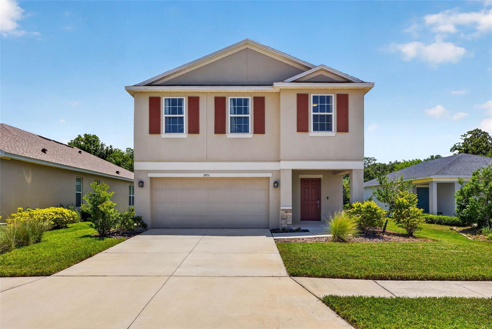 Welcome to 5951 Maidenstone Way, located in the highly desirable Artisan Lakes - the kind of community people move to and never want to leave. Built in 2020, this 4-bedroom, 2.5-bathroom Elm floor plan offers over 2,300 square feet of thoughtfully designed living space. Downstairs offers a nice open floor plan where the kitchen/living/dining flow seamlessly together. The living room features a beautiful custom accent wall and upgraded window casings. The kitchen has ample cabinetry, a separate pantry and storage closet. There is also a powder bathroom on the main floor. Upstairs, you'll find a versatile loft that can serve as a playroom, home office, or second living space, along with all four bedrooms and a conveniently located laundry room. The primary suite offers dual vanities, a walk-in shower, and a spacious walk-in closet. What truly sets this home apart, however, is the lot. Tucked away on a premium homesite with peaceful conservation views and no rear neighbors, you'll enjoy a level of privacy that's hard to find. The covered lanai is the perfect place to start your morning with a cup of coffee or unwind at the end of the day. Artisan Lakes residents enjoy access to incredible amenities including a resort-style pool, clubhouse, fitness center, playgrounds, basketball court, soccer field, dog park, and miles of walking trails, all while being conveniently located near I-75 with easy access to St. Pete, Tampa, and Sarasota. The house is great. The lifestyle is even better. Welcome home.