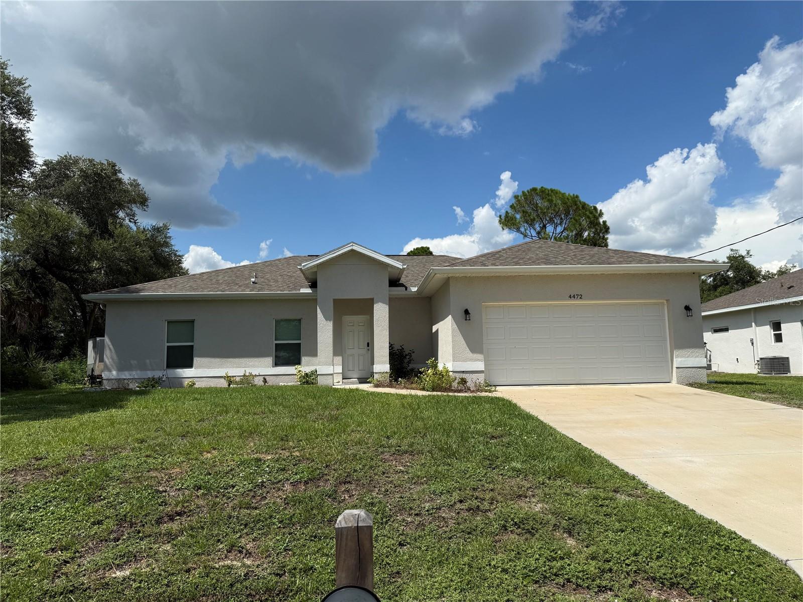 Comfort, Convenience & Investment Potential in North Port!

Welcome to 4472 Wall Lane, a well-maintained 3-bedroom, 2-bath home offering the perfect blend of modern comfort and long-term value. Currently tenant occupied, this property presents an outstanding opportunity for investors seeking immediate rental income in one of Southwest Florida's fastest-growing communities.

Inside, you'll appreciate the bright, open-concept floor plan featuring tile flooring throughout, solid surface countertops, abundant cabinet space, and a spacious kitchen that flows seamlessly into the dining and living areas—perfect for everyday living and entertaining. Sliding glass doors lead to the oversized backyard, offering plenty of room to relax or design your own outdoor retreat.

Ideally located just minutes from shopping, restaurants, parks, schools, and major roadways, this home combines convenience with the peaceful charm of a North Port neighborhood.

Interested in expanding your portfolio? The seller is also offering nine additional properties, providing a rare opportunity to purchase multiple income-producing homes. One of the available properties is currently vacant and available for showings, allowing buyers to view the floor plan and finishes firsthand.

Please note: The home is currently tenant occupied. Interior photos have been virtually staged to showcase the property's full potential.

Whether you're adding to an existing portfolio or making your first investment, 4472 Wall Lane is an opportunity you won't want to miss.
*Property is virtually staged