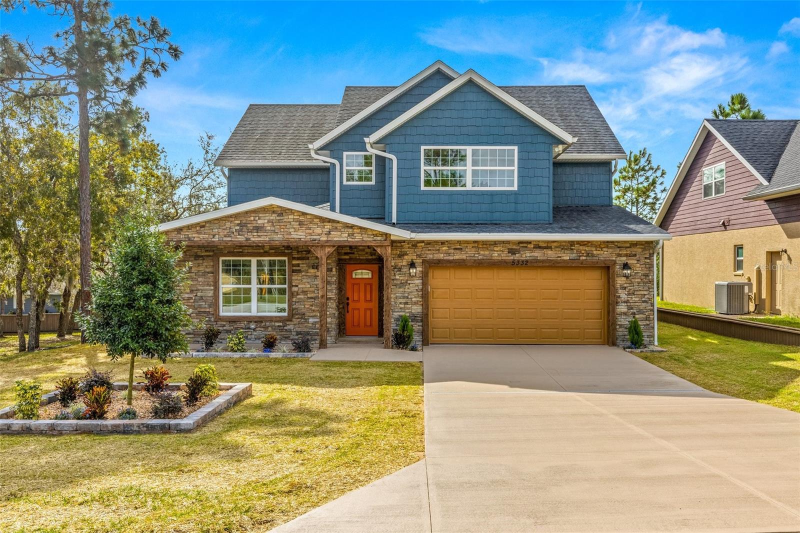•• HUGE, HUGE PRICE DROP ••  BRAND NEW MODEL HOME 01 NOV 2024!! GENUINELY OUTSTANDING CONSTRUCTION!! TURN-KEY READY! The St Marks floor plan is a true 5 BR, 4 full bath home with a 2 car + tandem space garage located in the beautiful new Stonegate community in Lecanto. The home is minutes from the newly opened extension of the Suncoast Highway making it an ideal location. Standard Features supersede virtually all other new construction builds. Large windows allow for an abundance of natural light. Main floor ls an open plan kitchen/living/dining. The kitchen has custom 42" cabinets with soft-close hardware, a large kitchen pantry, granite counters, travertine tiled breakfast bar and backsplash, separate dining area and a complete Whirlpool™ stainless steel appliance package. Additional downstairs space includes a separate 5th full bedroom/flex space with French doors, a large walk in closet and a separate full bath along with a beautiful, spacious downstairs laundry room. A large, finished concrete patio is situated off of the rear sliders. The upstairs owners retreat BR has volume ceilings, custom lighting, plant shelves, a large walk in bathroom w/dual vanities, large custom cabinets, garden tub, separate lighted shower, toilet and a large walk in closet. Of the 3 additional upstairs bedrooms, one is ensuite while the other two share a full bathroom. The shared bath has hall access and direct access from the large front bedroom. While the Standard Features are too numerous to mention, interior highlights include: a complete stainless steel kitchen appliance package, tray ceilings in select rooms, granite countertops in the kitchen and bathrooms, raised panel solid wood cabinets w/slow close doors & drawers, 12-14 mm laminate flooring in main living areas and bathrooms, carpet in upstairs bedrooms and solid core raised panel interior doors. Structural/mechanical highlights include: rain gutters, epoxied floors in the garage, custom built garage cabinets to contain the HVAC interior unit and hot water heater, closed cell spray foam insulation throughout to increase energy efficiency, Low-E energy efficient double pane windows, reinforced ceiling fan hookups, stone accents on the front of home, finished concrete patio in the rear and an additional tandem space within the 2 car garage. The current HOA is $125/mth. HOA fees cover community landscaping, maintenance, electric & reserves. The builder does not intend to build another St Marks floor plan making this a one-of-a-kind. Floor plan and HOA docs are available. Convenient to Tampa/TIA and famed recreational areas within Citrus county. This gem is offered by a longtime, established builder of over 30 yrs. If desired, the builder is offering a pool package with a retaining wall or an enhanced outdoor living area at an additional cost. TRULY IMMACULATE and a MUST SEE! Community pool and clubhouse are in planning stages, no finish date as yet. CDOM reflect a longer than desired build time owing to shutdown delays. Builder states, do not submit offers site unseen. Easy to show. This is not a distressed sale.