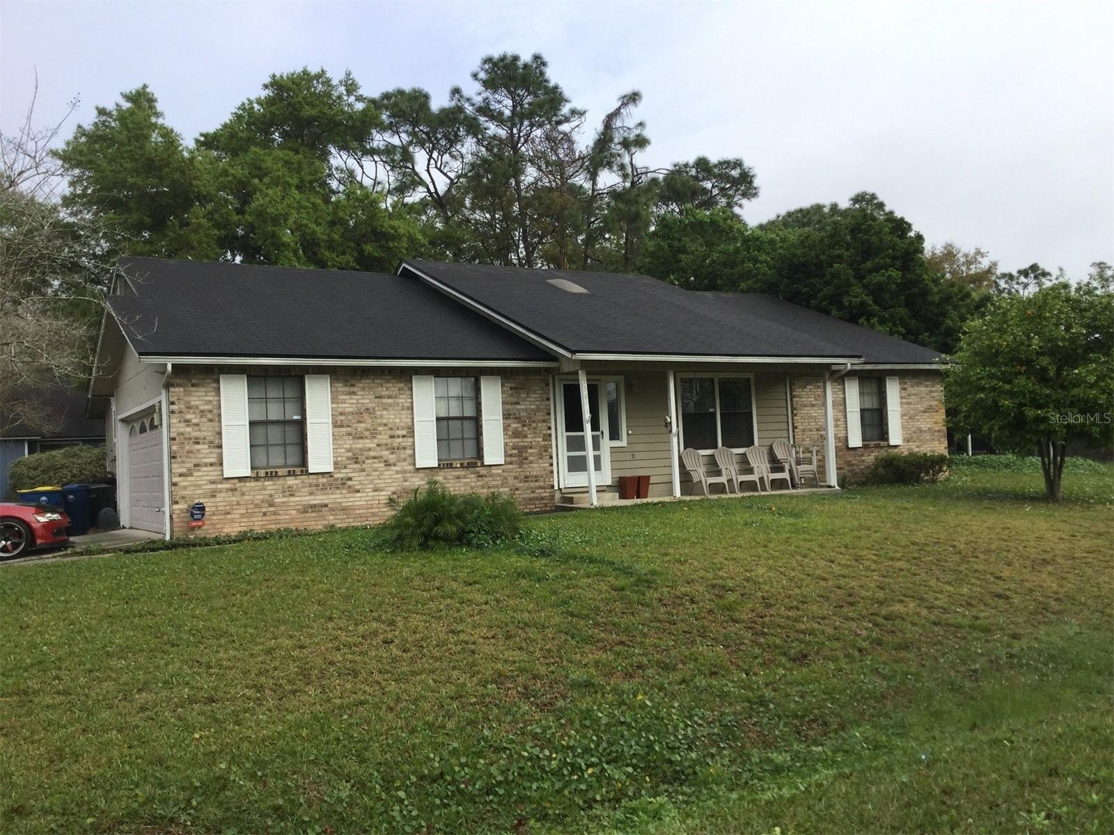 Attention investors and homebuyers with renovation loans! This 4 bedroom, 2 bath home  is a great opportunity for those looking to renovate. It is above average in size (1,900 sq ft) and features separate living, family rooms, a dining area off the kitchen, and a great room concept. The kitchen has a breakfast bar, granite counters, tiled backsplash, and stainless-steel appliances. The master bedroom is average in size and has a bathroom with shower. Other amenities include a recently replaced HVAC system, an energy-efficient water heater, a covered and screened patio, a wading pool, a two-car garage, and a separate RV port with storage facility. It sits on the largest lot in the neighborhood. There is no homeowner's association and investors are welcome.  Short-term rentals are not allowed. The average rent in the area is $2,500 per month, so this property has the potential to generate a significant return on investment for the right buyer.