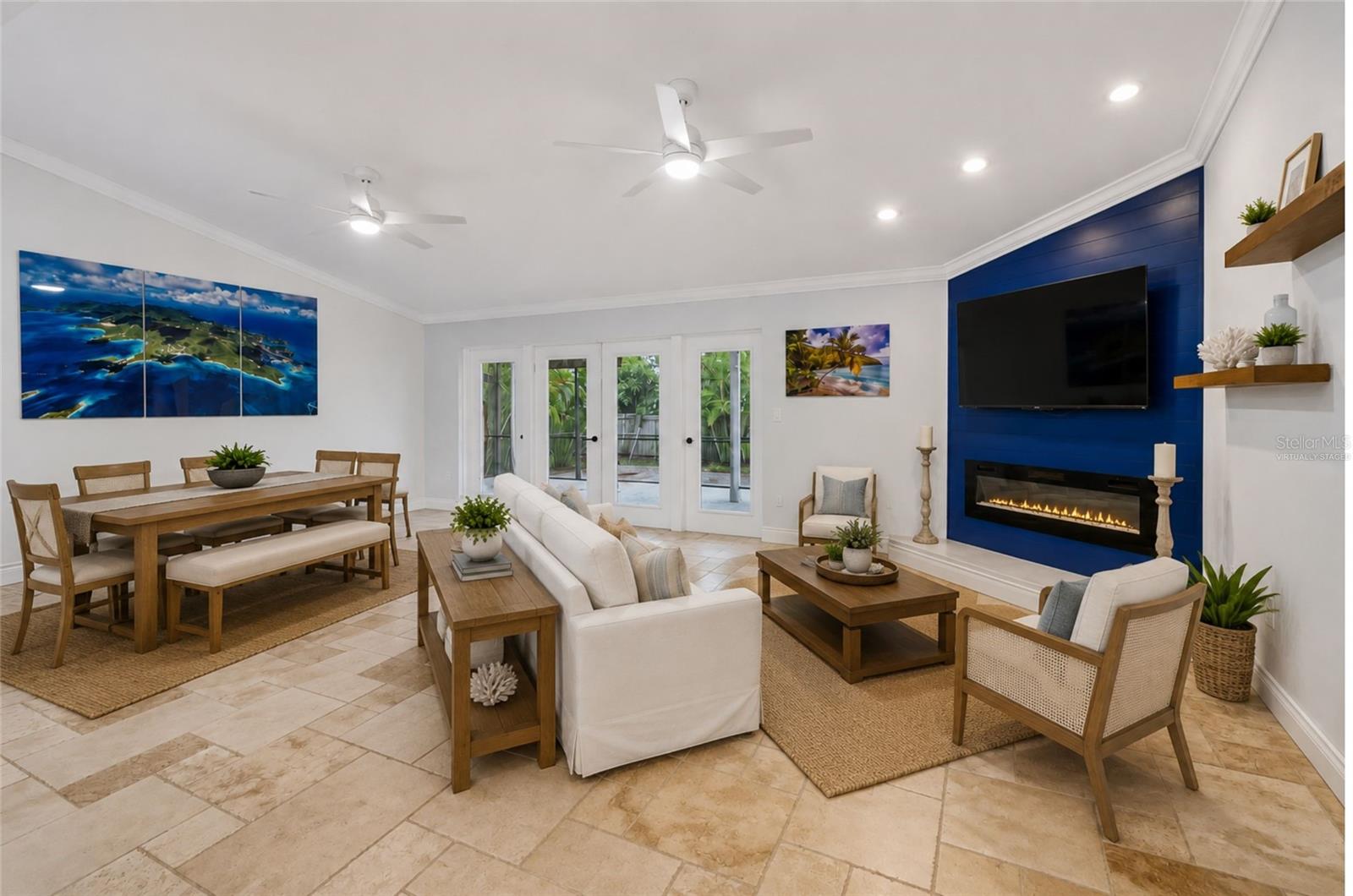 Nestled in the heart of Tarpon Springs, this well-maintained **3-bedroom, 2-bath** home offers the perfect opportunity to personalize your living space while enjoying the peace of mind that comes with many of the home's major improvements already completed. Thoughtfully maintained over the years, the property reflects pride of ownership with numerous enhancements, including hurricane impact windows (2023), roof (2023), HVAC (2022), refrigerator, range, and dishwasher (2023), hot water heater (2023), garage door rails and rollers (2024), screened patio (2023), electric fireplace (2024), water softener (2024), and updated ceiling fans throughout the home (2026). With many of the major systems already addressed, you can focus on adding your own cosmetic style and personal design touches.

The open floor plan creates a warm and inviting flow throughout the home, filled with natural light and designed for comfortable everyday living. The kitchen and living spaces offer an inviting gathering place for family and friends.

Discover one of Florida's most distinctive coastal communities. Explore the world-famous Sponge Docks, where authentic Greek restaurants, bakeries, specialty shops, waterfront dining, and rich cultural heritage create an experience unlike anywhere else. Stroll through historic downtown Tarpon Springs and discover charming boutiques, art galleries, local cafés, and year-round community events, including the popular First Friday celebrations featuring live music, local vendors, and family-friendly entertainment. Enjoy the convenience of golf cart-friendly areas that make exploring this vibrant coastal town even more enjoyable.

Outdoor enthusiasts will appreciate being just minutes from Fred Howard Park, Sunset Beach, boating, fishing, kayaking, and the Pinellas Trail, while award-winning Clearwater Beach is only a short drive away. With convenient access to both Tampa International Airport and St. Pete–Clearwater International Airport, you'll enjoy the perfect blend of coastal charm, small-town character, and everyday convenience.

Whether you're searching for a full-time residence, a seasonal retreat, or simply a place where you can create a home that reflects your own vision, you've found it! Schedule your showing today!