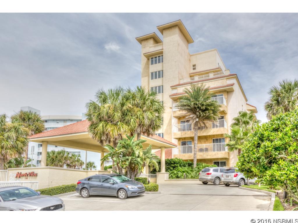 The Crown Jewel of New Smyrna Beach is what many locals call Atlantic Villas. Offered is this (never been rented) amazing upscale and estate style condo with captivating views and modern living with just a short walk to the famous Flagler Ave of New Smyrna Beach. This rare large 3 bedroom 3 bath, Ocean Front End Unit with direct ocean front views, over 9 ft ceilings and a tremendous amount of upgrades is surely to be your top choice. As you sit on your private balcony you will hear the waves of the ocean just a few steps away and the tranquil pool just off to your right as well. Enjoy sun rises siting on your oversized ocean front balcony as you sip on your morning coffee. Offered fully furnished with top quality furnishings. The upgrades are endless, from the high end from the high end upgraded wood cabinets and a monogram built-in fridge to the wine cooler and custom tile and granite throughout much of this home. Features gated underground parking as well as (2) storage units. There are only 2 private storage rooms offered in the entire complex and this unit comes with one of the 2. Deeded to you and your right outside your front door. A true blessing to have all this extra private storage. Also features wonderful ocean views seen from the large Master Suite. Here is something you must consider when buying on really high floors, you lose so much, you lose the views and the sounds of what is going on around you. Why live in the sky or pay the price for something you have to lean over a balcony to see or hear? Well not here, you are at the perfect height to catch all the sights and sounds from all the living areas of this condo. So at night time you are not looking into an abyss of darkness. And in the daytime you are enjoying all the views up and down the ocean coast. Do not miss this rare opportunity. Upon request we have a true 3D tour of this property. Owner will consider financing. All information intended to be accurate but not guaranteed. ;LocationDescription: Condo ;Water: City