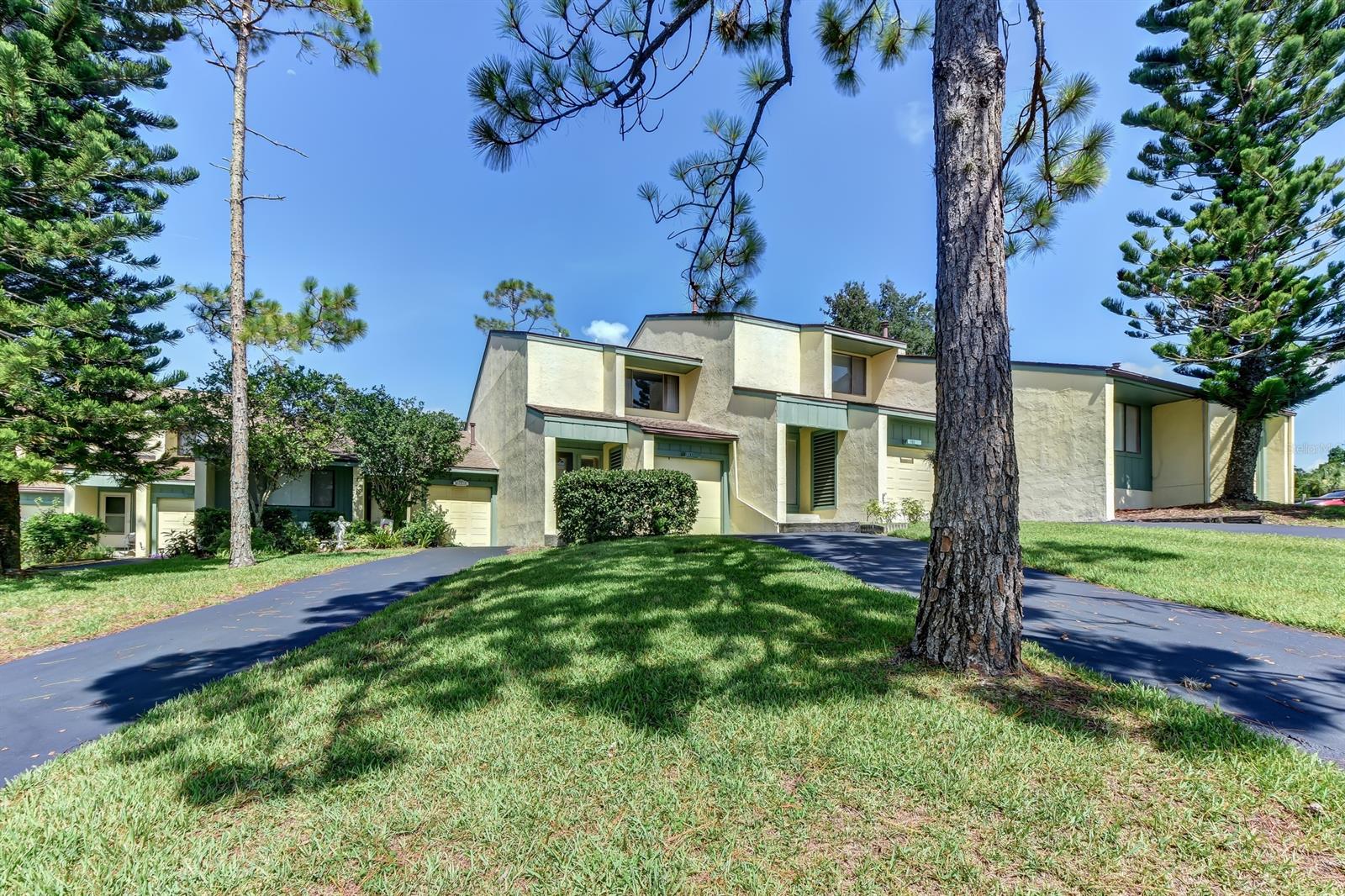 Beautiful 2 bedroom 2.5 bath condo located in Sugar Mill. This home is clean and ready to move in. New A/C in 2020. First level is tiled throughout with a 1/2 bath and laundry area, kitchen, dining and living room with plantation shutters. Upstairs has two bedrooms with two full baths. Balcony off master suite, walk in closet. Golf cart garage. Assigned parking and community pool. This unit is close to the parking area. Join Sugar Mill Country Club and enjoy the fitness and swim center.   Member-owned and private with club amenities that are second to none. 27-hole Championship Golf Course, Har Tru Clay Tennis Facility, Pickleball Courts, Fitness and Swim Center and a Clubhouse with three dining venues. ;LocationDescription: Condo ;Water: City