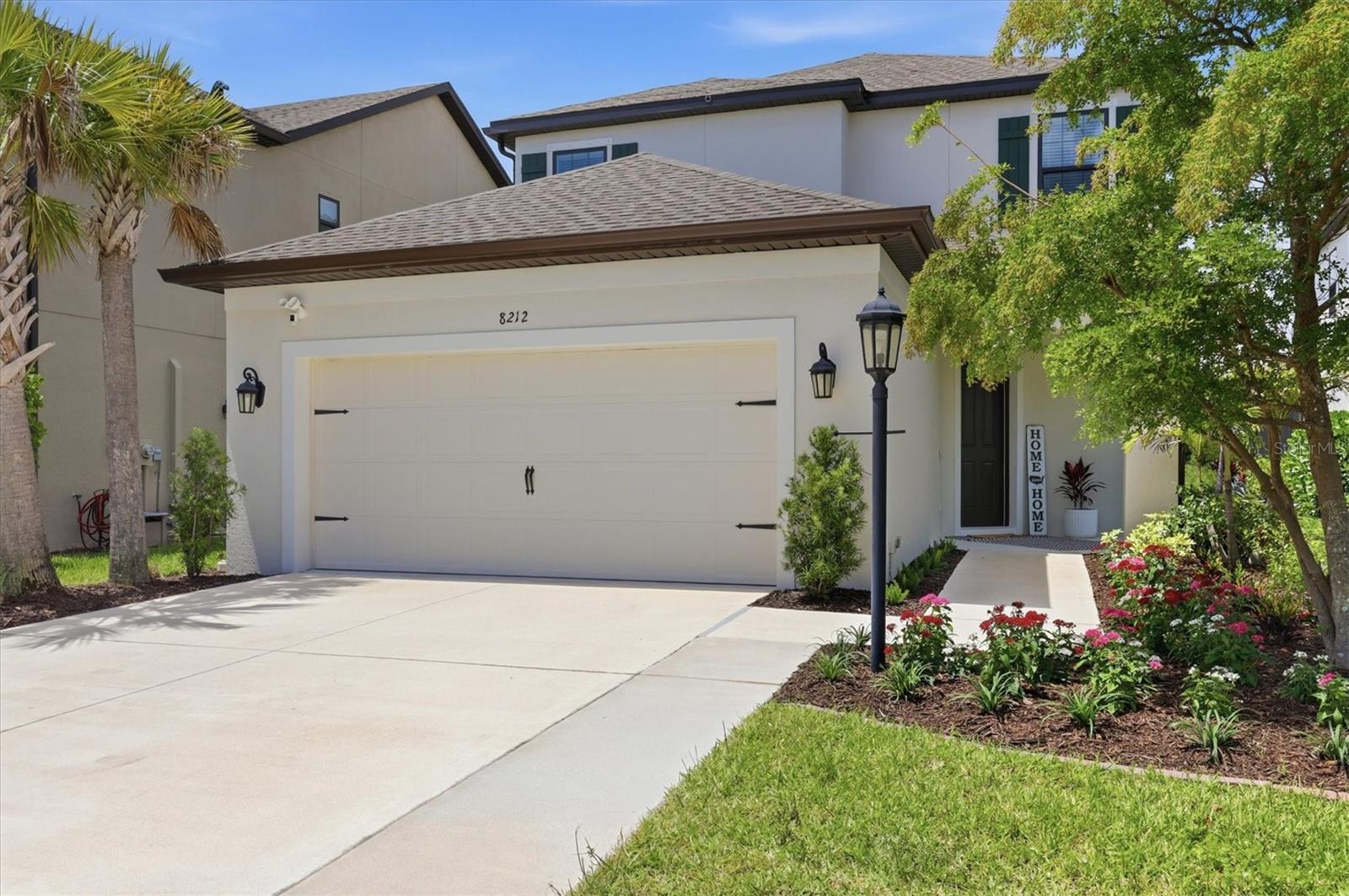 One or more photo(s) has been virtually staged. LOCATION, LIFESTYLE, AND LUXURY come together in this beautifully updated home in the highly sought-after Skye Ranch community. Convenient walking distance to K-8 school, amenities and park. This home features 4 bedrooms, 3.5 baths, flexible living spaces including an office, loft and media/game room, and outdoor living that defines Florida living. As you enter the home you notice the stunning tile in a herringbone pattern leading you to the gorgeous kitchen with quartz counters, subway tile backsplash, gas cooktop, a spacious pantry, and plenty of seating at the bar area. The dining and living spaces blend seamlessly creating an open and inviting atmosphere where a custom wood wall elevates the living room. Designed with entertaining in mind the outdoor living space features a perfectly positioned HEATED SALT-WATER POOL AND SPA, OUTDOOR KITCHEN, and generous covered lanai. The primary suite is bright with windows overlooking the lanai and pool area. The en-suite bath has split vanities, a walk-in closet and a linen closet, large walk-in shower, and a private water closet. Also on the first floor is an office with french doors, a half bath and the laundry room. On the impressive second floor you’ll find 3 more bedrooms and one with an en-suite bathroom. The other 2 bedrooms share a full bathroom with dual sinks, shower and tub. The media/game room and the loft both offer endless possibilities from movie nights, gaming, relaxing, or gathering with friends. Stylish lighting and neutral tones complement the home’s modern design. Added french drains on both sides of the house provide enhanced drainage. MAJOR RECENT ENHANCEMENTS include ALL NEW WINDOWS, new carpet, hvac ducts HEPA cleaned, air purifier and uv lights installed in both hvac units, new attic insulation, and SO MUCH MORE - THIS IS LIKE A NEW HOME! This property sits on a prime lot overlooking the pond with no rear neighbors. Enjoy the convenience of being a short walk or bike ride to The Hub, the main clubhouse in Skye Ranch. This amazing community is equipped with a cafe, resort-style pool, Junior Olympic pool, splash pad, fitness center, rock climbing, tennis, pickleball, bocce ball, indoor and outdoor basketball, sand volleyball, baseball fields, even a pond for fishing. The Lifestyle Team can assist you in joining an Interest Group or Social Club or help you create a new one. Concierge offers discounts to residents from local businesses.  A new K-8 school is another fantastic community asset. Enjoy miles of walking trails with lush landscaping connecting you to all the exceptional amenities. Skye Ranch in its convenient location allows for an easy drive to Siesta Key Beach, I-75, UTC, downtown Sarasota and many restaurants, shops, banks and medical facilities. This is Florida living, done beautifully.