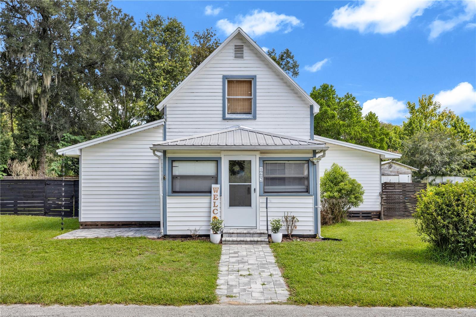 Built in 1915 and lovingly restored to honor its roots, this rare Historic Lake Helen home sits on over half an acre and delivers the kind of character and craftsmanship that simply cannot be replicated.

Step inside and you are greeted by farmhouse style finishes, all new appliances, and thoughtful updates throughout every room. The layout offers 3 bedrooms, 2 bathrooms, and 1,666 square feet of beautifully remodeled living space, plus a versatile upstairs loft perfect for a home office, playroom, or guest retreat. New stairs and stair railing were just installed in 2026. The big ticket items are already done for you: roof replaced in 2021, full PEX plumbing re-pipe completed in 2023, two master bedroom windows replaced, and all new hardware throughout.

Step outside and the property truly comes alive. A wrap around deck sets the tone for slow mornings and golden hour evenings. The fully fenced backyard provides privacy and peace of mind, and the pool gives you a cool escape all summer long, both installed in 2022.

Over half an acre. No HOA headaches. Just space, privacy, and room to breathe.

And then there is Lake Helen itself. Known as "The Gem of Florida," this small historic town offers something you simply cannot find in a subdivision: a genuine sense of community. You get the small-town lifestyle with a local café, pizza shop, art studio, parks, and year-round community events. Peaceful and quiet, yet under 30 minutes to the sands of New Smyrna and Daytona Beach, and less than 40 minutes to Orlando. You get the best of both worlds.

Opportunities like this, a century old home with updated bones, acreage, a pool, and a lifestyle you cannot manufacture, do not come around often in Lake Helen. Schedule your private showing today.