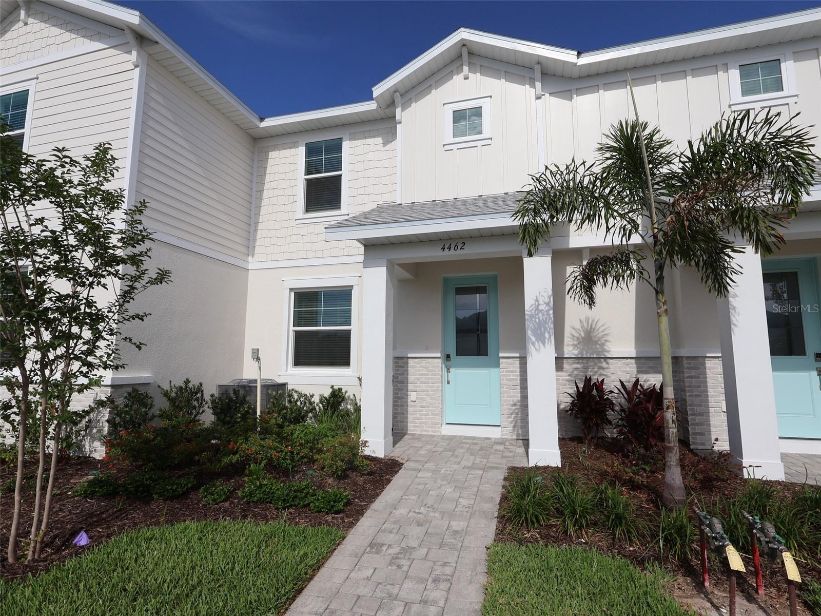 ****SPECIAL FINANCING AVAILABLE FOR A LIMITED TIME ONLY FROM PREFERRED LENDER. RESTRICTIONS APPLY, FOR QUALIFIED BUYERS, SUBJECT TO APPLICABLE TERMS AND CONDITIONS. SUBJECT TO CHANGE WITHOUT NOTICE****
Welcome home to the Bay Harbor. At 1,706 square feet, this townhome features three bedrooms, two and a half bathrooms, and a rear-load, two-car garage.
Walking through the front door, you’re greeted by the spacious great room. 
Farther in the home sits the gorgeous kitchen with plenty of cabinet and counter space, a center island, and the café. You’ll love cooking your favorite recipes and enjoying entertaining your friends in this space.
The kitchen is the focal point of the main living space for continual conversations and non-stop entertainment. Spend your weekends whipping up some appetizers with your guests while watching football or kicking back in your favorite recliner after a long day. Adjacent to the kitchen are the powder bath and laundry room.
Head out the back door and walk into your own personal oasis. The lush courtyard features a partially covered lanai that connects to the two-car garage.
Head upstairs and find the luxurious owner’s suite and an additional two bedrooms. The light-filled owner’s suite features two light-filled windows, a walk-in closet, and a private owner’s bathroom. The other two bedrooms are side-by-side and share a second full bath with tub.
