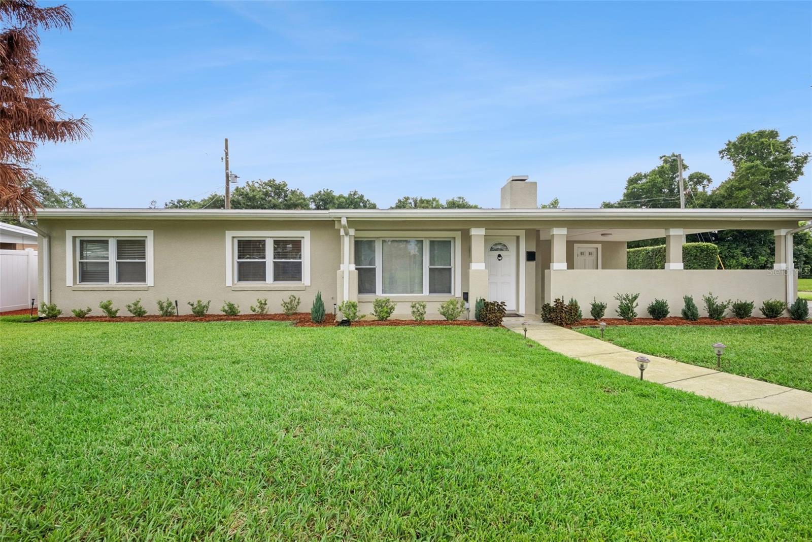 Sensational ALL-Block Home in Maitland with NO HOA and Deeded Private Lake Access! Nestled within Lakewood Shores, a charming and  welcoming enclave of 42 homes, this 3BR/2BA residence offers a leisurely lifestyle with deeded access to Lake of the Woods via private neighborhood boat ramp. Venture inside to discover an openly flowing traditional layout, soft natural light, well-equipped kitchen w/skylights, separate dining area, and a cozy living room with a wood-burning fireplace. Each bedroom is generously-sized, while the primary bedroom has an en suite w/step-in shower. Enjoy the entertaining possibilities of the screened-in lanai, as well as the fenced-in backyard boasting a shed with electricity connected. Other features: attached carport w/newly epoxy floors, indoor laundry area, updated windows/plumbing/water heater, cost-savings well sourced irrigation system, near Maitland Art Center, Lake Lily Park, and the Enzian Theater, close to Downtown Maitland, Park Avenue, Winter Park Village, I-4, and much more! Call and schedule your private showing today!
