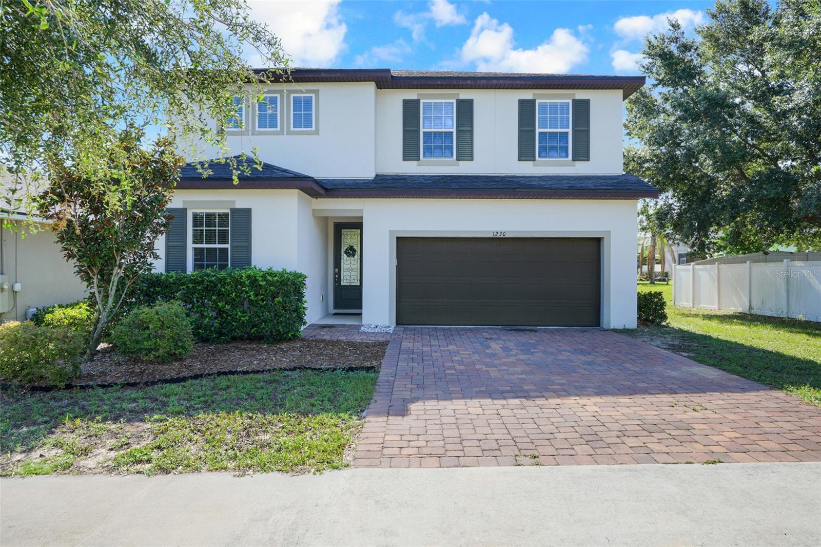 Welcome to this beautiful 4-bedroom, 3 full bathroom  home offering over 2,600 square feet of living space designed for the way today’s buyers actually live. Space. Function. Flexibility. From the moment you walk in, this home delivers the room everyone is searching for with expansive living spaces, generously sized bedrooms, and a layout that gives everyone the ability to spread out without sacrificing connection. Whether you need space for a large household, multigenerational living, a home office setup, gym, playroom, or all of the above — this home gives you options. At the center of the home is a beautifully designed kitchen featuring quartz countertops, stainless steel appliances and a large pantry that delivers both style and functionality. The open-concept layout creates the perfect setup for entertaining, hosting holidays, or simply enjoying everyday life with plenty of room to gather. One of the standout features is the downstairs layout offering a private guest bedroom with a full bathroom nearby — ideal for guests, multigenerational living, or an in-law setup.   Upstairs, the oversized loft creates the perfect flex space for a second living room, media room, game room, or office. The spacious primary suite offers a relaxing retreat with plenty of room to unwind, while the additional bedrooms are generously sized and thoughtfully positioned throughout the home. Step outside to a large full length of the home lanai and a backyard with room to play, space for pets, and the perfect setup for relaxing or entertaining outdoors. Located inside Preserve at Sunrise, residents enjoy a community pool, playground, and convenient access to shopping, dining, schools, and major roadways while still enjoying the peaceful feel Groveland is known for. Homes with this much square footage, bedroom count, and versatility are hard to find — especially with upgrades like these.