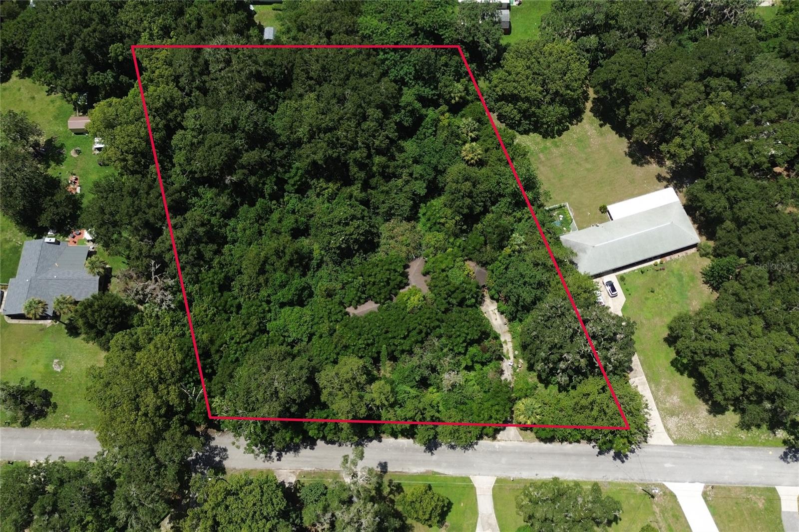 2 acre property located with NO HOA in the Glenwood area just off of Grand Avenue. This will be an opportunity for you to build your home without the impact fees that come with new construction. The home that is currently there has been scheduled for demolition by the county within the next 60 days. Seller will be responsible for cost of demolition and paid out at closing.