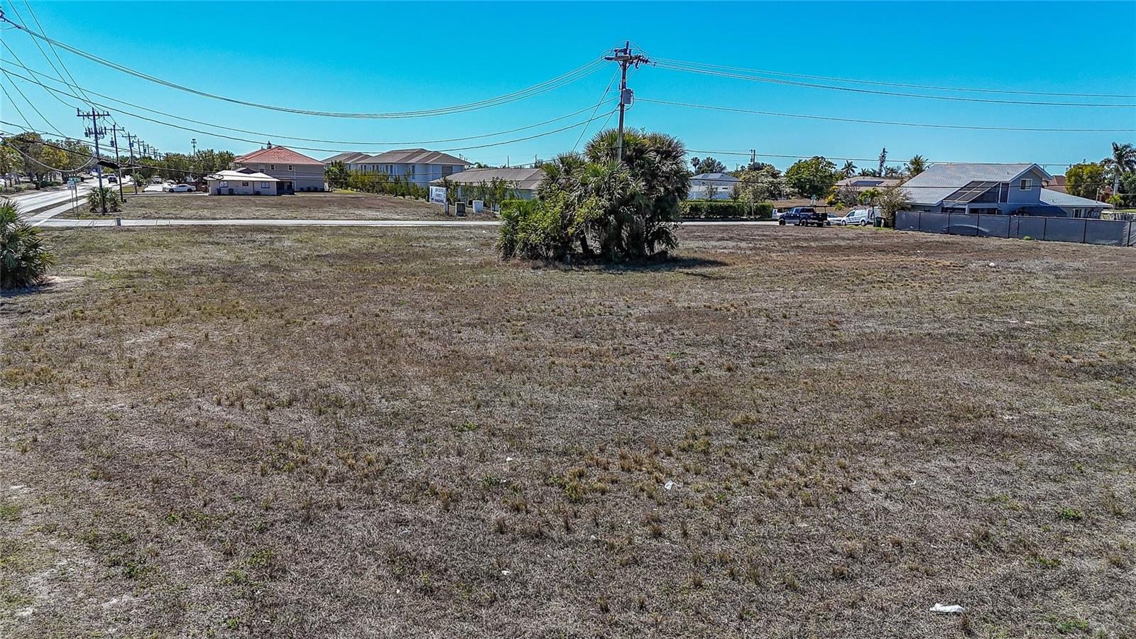 Flood Zone X. Positioned on a 1.127-acre parcel comprising nine lots, this exceptional property offers 154 feet of frontage on Gleason Parkway and 217 feet along Skyline Boulevard, providing excellent visibility and accessibility. Zoned R-3 Multi-Family, the site allows for up to 16 multi-family units per acre, presenting a prime opportunity for residential development. The flexible zoning also supports alternative uses such as a daycare, place of worship, and other permitted community-oriented facilities. Ideally located just minutes from Veterans Parkway and Cape Coral Parkway, the property features a wide variety of restaurants, shopping, and entertainment nearby, making it a highly desirable location for future development or investment. PLEASE see attached supplements of SITE PLANS and ARCHITECT DRAWINGS. Please see the attachment for the small utility ASSESSMENT PAYOFF.