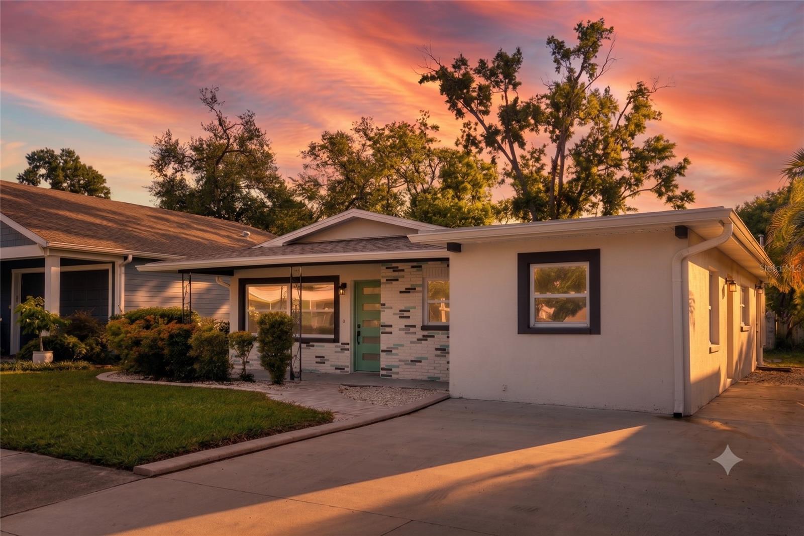 Virtually Staged. Searching for the combination of complete peace of mind and unparalleled convenience in Tampa? This turnkey 4BD/3BA mid-century block home is insurance-friendly, featuring a New Roof, HVAC, Windows, Doors and Electrical Panel. Minutes from Tampa International Airport and 15 minutes to Downtown, it is the ultimate opportunity offering modern comfort and a prime location.

Welcome to a beautifully remodelled mid-century modern residence updated in a modern style. Tucked into the quiet Lincoln Gardens neighborhood, an established community that is also undergoing an exciting transformation with new homes commanding up to $900,000. This is driven by being positioned close to high-end dining/shopping, easy access to travel, and major sports venues: Raymond James Stadium, the proposed Rays Stadium, and George Steinbrenner Field. 

Step inside to a bright interior lit by natural light designed for the rhythm of modern life. The interior features a refreshed kitchen with durable granite countertops, brand-new appliances, and wood cabinets. With four bedrooms and three full bathrooms, there is plenty of room for a growing household or a dedicated home office.

The amazing value in this home lies in its renewal. Every major big-ticket item has been taken care of: a brand-new Roof, new high-efficiency Windows and Doors, a new HVAC system, and a newly updated Electrical Panel. Along with new luxury vinyl plank flooring throughout plus fresh paint inside and out! You can move right in without the stress or expense of upcoming maintenance.

Outside, the generous lot features a large, securely fenced backyard shaded by mature trees. It is a fantastic canvas for outdoor entertaining, pet lovers, or a future pool. Directly beyond your property line sits the Loretta Ingraham Recreation Center, serving as an incredible, free lifestyle extension equipped with a pool, fitness room, and summer camps.

Positioned at the center of everything, you are a mere two minutes from the premier shopping and dining at International Plaza, five minutes from the terminal at Tampa International Airport, and fifteen minutes from downtown Tampa. Looking for white sand beaches? Clearwater Beach is an easy forty-minute drive away.

To complete this exceptional offering, the seller is providing a $15,000 Credit to use toward Closing Costs or a Rate Buy-Down (pending an acceptable offer), making this move-in-ready home an undeniable value in a rapidly rising neighborhood. Seller to provide refrigerator and wall oven plus add sod in back yard up to the property line prior to closing. *Virtual Sod Added, no other virtual staging added. Make an appointment today to tour this gem and make it yours!