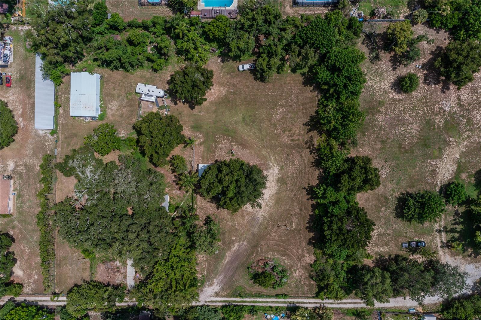 Prime Development Opportunity in the Heart of Brandon! Rarely does a property with this much potential become available in such a highly desirable location. Situated on 2.64 acres in the sought-after Southeast Lumsden Road and John Moore Road corridor, this property is surrounded by established neighborhoods and offers exceptional possibilities for builders, developers, or those looking to create a private estate close to Lithia Pinecrest Road. Currently zoned RSC-6, the property may allow up to six residential homes PER acre. The existing 1,088-square-foot concrete block home, built in 1958, requires substantial renovation and is being sold as-is. The primary value is in the land. Additional improvements include a 50’ x 30’ metal garage/workshop (built in 2004), two wells (one currently operational), and an existing septic system. Enjoy the freedom of No HOA, No CDD, and Flood Zone X—no flood insurance required. Located within the highly regarded Brooker Elementary, Burns Middle, and Bloomingdale High School districts. Conveniently positioned with quick access to US-301, I-75, I-4, and Downtown Tampa, making commuting throughout the Tampa Bay area a breeze. Whether you’re envisioning a new residential development, a family compound, or your own private estate surrounded by mature trees, this is an exceptional opportunity in one of Brandon’s most desirable growth corridors. Competitively priced and offered for cash or conventional financing only. Buyers are encouraged to perform their own due diligence regarding zoning, land use, density, utilities, and future development opportunities.