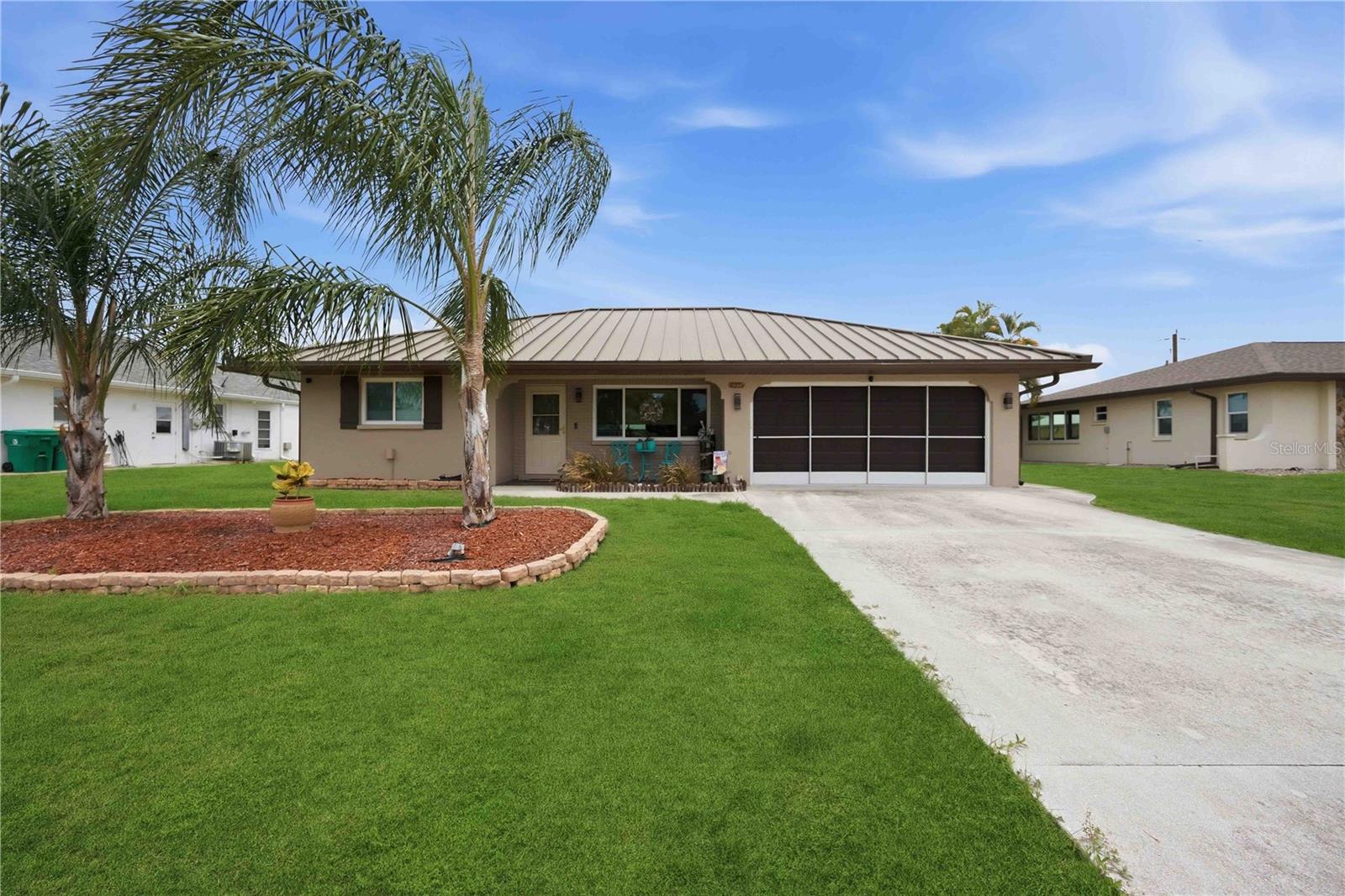 Immaculate home with JACUZZI, fenced-in backyard in an "X flood zone" located in the desirable area of Englewood with no deed restrictions or HOA fees. This home has ALL the upgrades including a new a metal roof, HVAC (2023), hurricane impact windows and sliding glass doors (2023), screened and extended covered lanai (2023), all NEW lighting & fans, freshly painted exterior (2026), Hot water heater (2026), and SO much more! As you walk up to the front door and step inside, an open floor plan with easy-to-maintain tile throughout the home, and neutral color scheme welcomes you into the spacious living room. Entertaining is a breeze with the dining area open to the kitchen where you can gather with your family and friends. The updated kitchen features wood cabinetry, granite countertops, dark stainless steel appliances and a closet pantry. Expand your living space outdoors where you can relax under the large covered lanai with ample room for seating and your very own jacuzzi (2023) accommodating up to 5 people! If that's not enough the large fenced-in backyard offers plenty of space for fun activities, or a place to park your boat and RV! The roomy shed features electric and offers additional storage space or is perfect for a workshop. There is plenty of space inside with a “split” bedroom plan offering privacy for all, the primary suite offers a spacious bedroom with a large walk-in closet, and ensuite bathroom featuring a NEW vanity and toilet with a tiled shower. On the opposite side of the home is the additional bedroom with a ceiling fan and built-in closet--and guest bathroom featuring a new vanity, toilet, a shower/tub combination with tiled walls, and a linen closet. All of this plus a two car garage. This home is a MUST SEE! Don't miss the opportunity to make this YOUR Florida dream home! Located just minutes from Manasota Key beach, quaint shops and restaurants, golf courses and so much more!