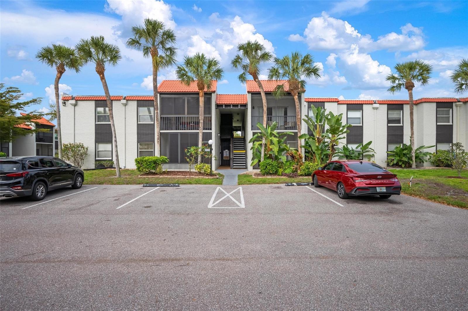 Beautifully updated 2-bedroom, 2-bathroom condo located in the centrally positioned Village Brooke community, just minutes from downtown Sarasota, Gulf beaches, shopping, dining, and golf courses. This bright and inviting residence features a modern interior with wood-look luxury vinyl flooring throughout, an updated kitchen and bathrooms, and upgraded interior doors and baseboards. The thoughtfully designed layout offers comfortable living spaces and ample storage, including a private exterior storage room.
A new HVAC system installed in 2026 adds efficiency and peace of mind. The unit also includes a designated parking space conveniently located just outside the building.
Village Brooke offers a range of amenities including two swimming pools, a clubhouse with catering kitchen, tennis courts, pondside grilling areas, and an on-site manager. Community laundry facilities are located nearby, and the monthly fee includes water, cable, and trash service. Select furnishings may be available under a separate agreement.
