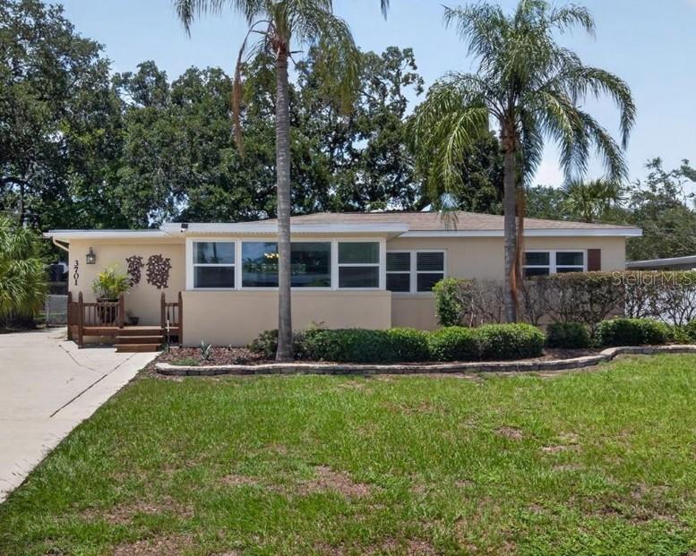 Rare opportunity to own two homes on one lot in the heart of Orlando's highly desirable Audubon Park Garden District! Situated on a single parcel, this unique property features a 1,420 sq. ft. main residence and a 688 sq. ft. detached ADU with its own private entrance, offering endless possibilities for multigenerational living, rental income, guest accommodations, or a private home office.

The main home offers 3 bedrooms, 2 bathrooms, and a functional split floor plan. Built in 1954, it has been thoughtfully updated with major improvements throughout. A 2021 roof, new windows in 2024, new HVAC system and ductwork in 2022, all-new porcelain tile flooring installed in 2021, and a new refrigerator in 2025 provide peace of mind for years to come. With no carpet anywhere in the home, maintenance is simple and stylish. The spacious front living room is surrounded by windows, flooding the space with natural light and providing beautiful views of Virginia Drive. Plant lovers will appreciate the bright, welcoming atmosphere. The primary suite features a fully renovated bathroom completed in 2022 with dual vanities and LED shower lighting. The kitchen is equipped with dual built-in ovens and overlooks the backyard, garden area, and guest house.

Outside, you'll find a fully fenced backyard designed for entertaining and relaxation. String lights create the perfect evening ambiance while raised garden beds and vegetable gardens add charm and functionality. Whether hosting friends, enjoying a quiet evening outdoors, or tending to your garden, this backyard was made to be enjoyed.

The detached ADU, built in 1990, offers approximately 688 square feet of living space with 1 bedroom, 1 bathroom, a full kitchen, utility room with laundry, and its own private entrance. Recent improvements include a brand-new 2025 roof, new mini-split system installed in 2025, and a new bathroom exhaust fan added in 2026. The ADU has generated just under $30,000 annually as both a short-term and long-term rental, providing an excellent opportunity for supplemental income, multigenerational living, or a private guest retreat.

Additional features throughout both homes include dimmable outlets and lighting controls, as well as a comprehensive security system for added convenience and peace of mind.

Located just blocks from neighborhood favorites like Domu and Kelly's Homemade Ice Cream, you'll enjoy the walkable lifestyle that makes Audubon Park one of Orlando's most sought-after communities. Grab dinner, meet friends for dessert, explore local shops, breweries, and parks, and experience firsthand why this neighborhood continues to be one of Orlando's premier places to call home.

Properties offering a move-in-ready main home, detached guest house, proven income potential, extensive updates, and an unbeatable location rarely become available. This is your chance to own a truly unique piece of Audubon Park living.