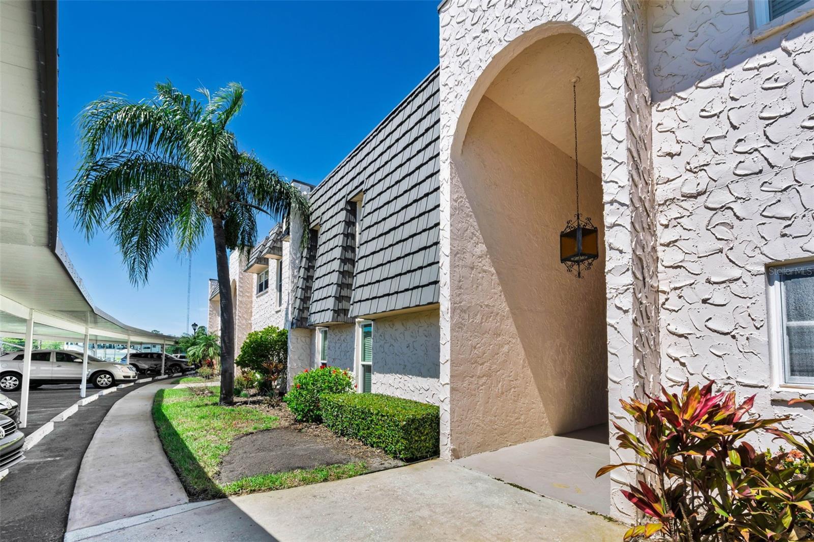 Spacious meticulously kept with upgrades in the sought-after Gardens 55+ community, with low fees that include allot.  Open floor plan with hardwood flooring, generous living area and abundant natural light. Family room overlooks the pool and green space; large primary bedroom features a walk-in closet. Private rear entrance provides direct, easy access to the on-site pool, clubhouse and landscaped grounds. Move-in ready — a must-see. 

The Gardens offers a peaceful setting and excellent amenities, including a heated pool, tennis and pickleball courts, horse shoes, shuffleboard, and a clubhouse with large-screen TV, pool table, barbecue grills and full kitchen. 

Recent updates include new roof (2026), newer hot water heater, updated appliances, upgraded flooring and fresh paint. No assessments due and none on the books.
The Condo association provides for lawn care, internet with cable, water, sewer and garbage, common area maintenance, and community amenities along with building exterior maintenance.
 Convenient location, quiet setting — must see.