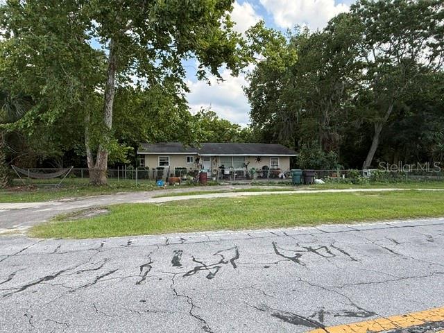 Auction Property. 1 Story home located on a corner lot is being sold through the auction process. The home features 3 bedrooms and 1.5 baths. The home is located within the Marimere neighborhood of Ocala. Located  near Downtown Ocala, Ocala Square, and Silver Springs. The home is also located near Vanguard High School. This fixer upper has great potential to be converted into your ideal living space or can be added into your rental portfolio. The home is being sold in as is condition through the auction process. Do not disturb occupants.