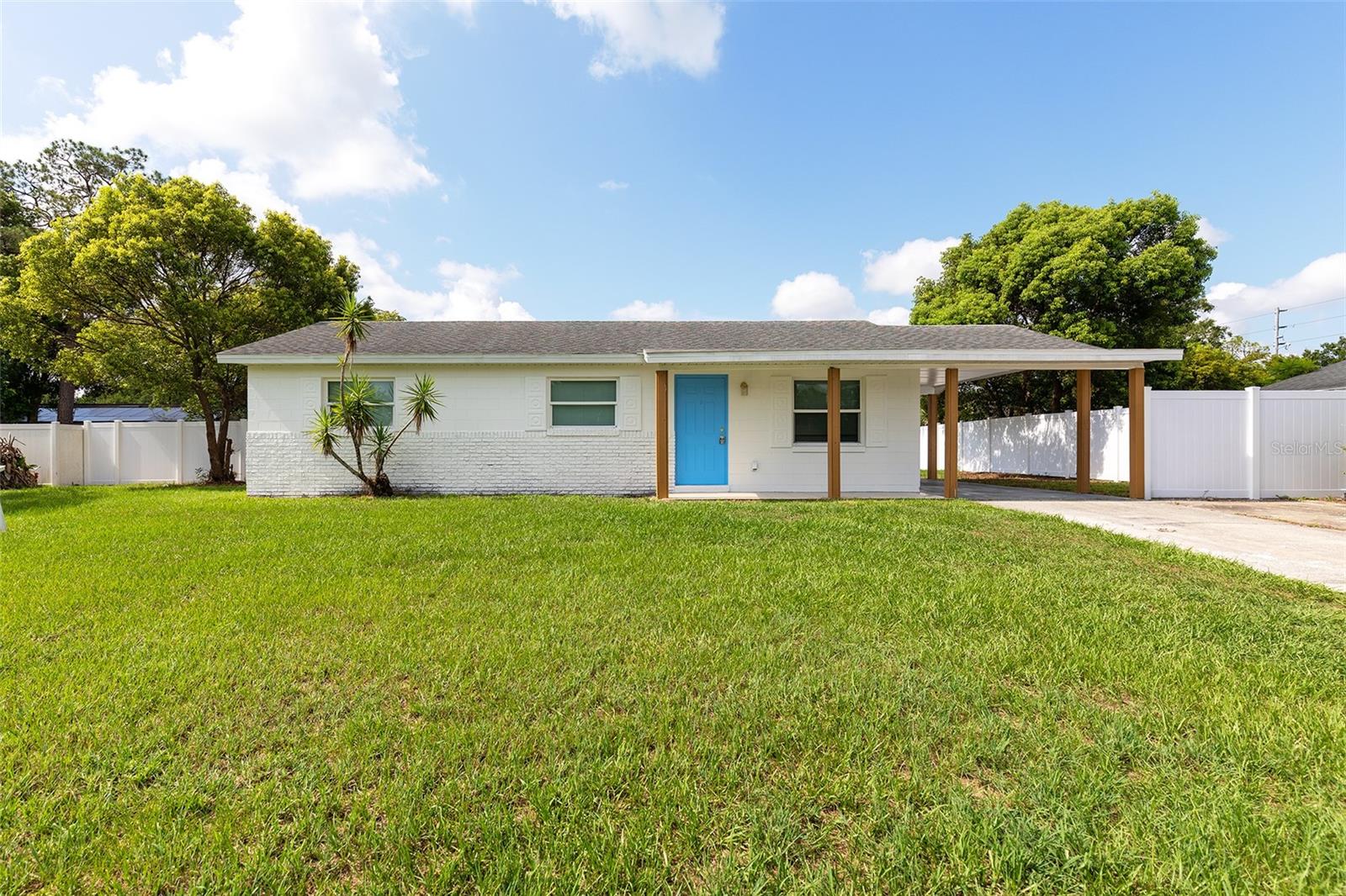 FULLY RENOVATED & MOVE-IN READY! Welcome to this beautifully updated 3-bedroom, 1-bath home offering the perfect combination of modern finishes, functionality, and outdoor space. From the moment you arrive, you'll appreciate the fresh exterior, inviting curb appeal, and spacious carport.

Step inside to an open and bright floor plan featuring fresh paint, updated lighting, and a seamless flow that's perfect for everyday living and entertaining. The stunning kitchen is the heart of the home, showcasing timeless shaker cabinets, quartz countertops, stainless steel appliances, modern gold hardware, and plenty of cabinet and counter space.

The beautifully remodeled bathroom offers a spa-like feel with a custom-tiled walk-in shower, a designer vanity with dual sinks, a quartz countertop, elegant gold fixtures, and contemporary finishes throughout.

Outside, you'll fall in love with the oversized, fully fenced backyard, offering endless possibilities for entertaining, adding a pool, creating a play area, or simply enjoying Florida's outdoor lifestyle. Whether you're hosting family gatherings or relaxing after a long day, this backyard provides the space you've been looking for.

Conveniently located near shopping, restaurants, schools, major highways, Downtown Orlando, and Orlando International Airport, this home offers both comfort and convenience.

This is a rare opportunity to own a fully renovated, move-in-ready home with a huge backyard in the heart of Orlando. Schedule your private showing today!