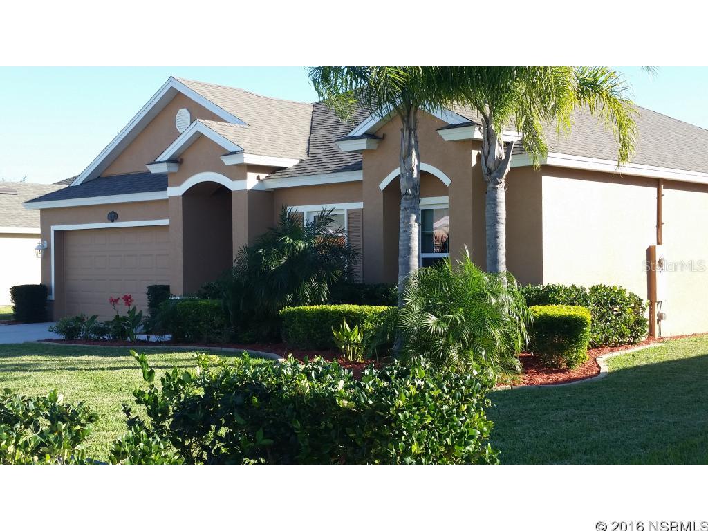 Under contract taking backups. Walk through the front door and have a feeling of beauty and calm with this open floor plan that overlooks a spectacular pool area with lush landscaping. Located in the lovely and friendly neighborhood of Sugar Mill Gardens, which is a part of Sugar Mill Country Club communities with golf cart access between SMG and SMCC. This home features vaulted ceilings, upgraded carpet and lighting fixtures, decorative front door, wireless security system that includes wireless phone access capabilities. Kitchen has granite countertops with decorative backsplash, stainless steel appliances and pantry. Bathrooms have cultured marble tops. Master bedroom features a decorative tray ceiling and two walk in closets. Pool and spa is controlled by an Aqua Logic remote system, salt water chlorinated and gas heated. Plush landscaping with sprinkling system and vinyl fencing offers pool privacy. The pool area also includes an outdoor bar with a bull gas grill and refrigerator for ultimate relaxing and entertaining. MSD Home Warranty with eight years remaining, transferrable to purchaser. ;Water: City