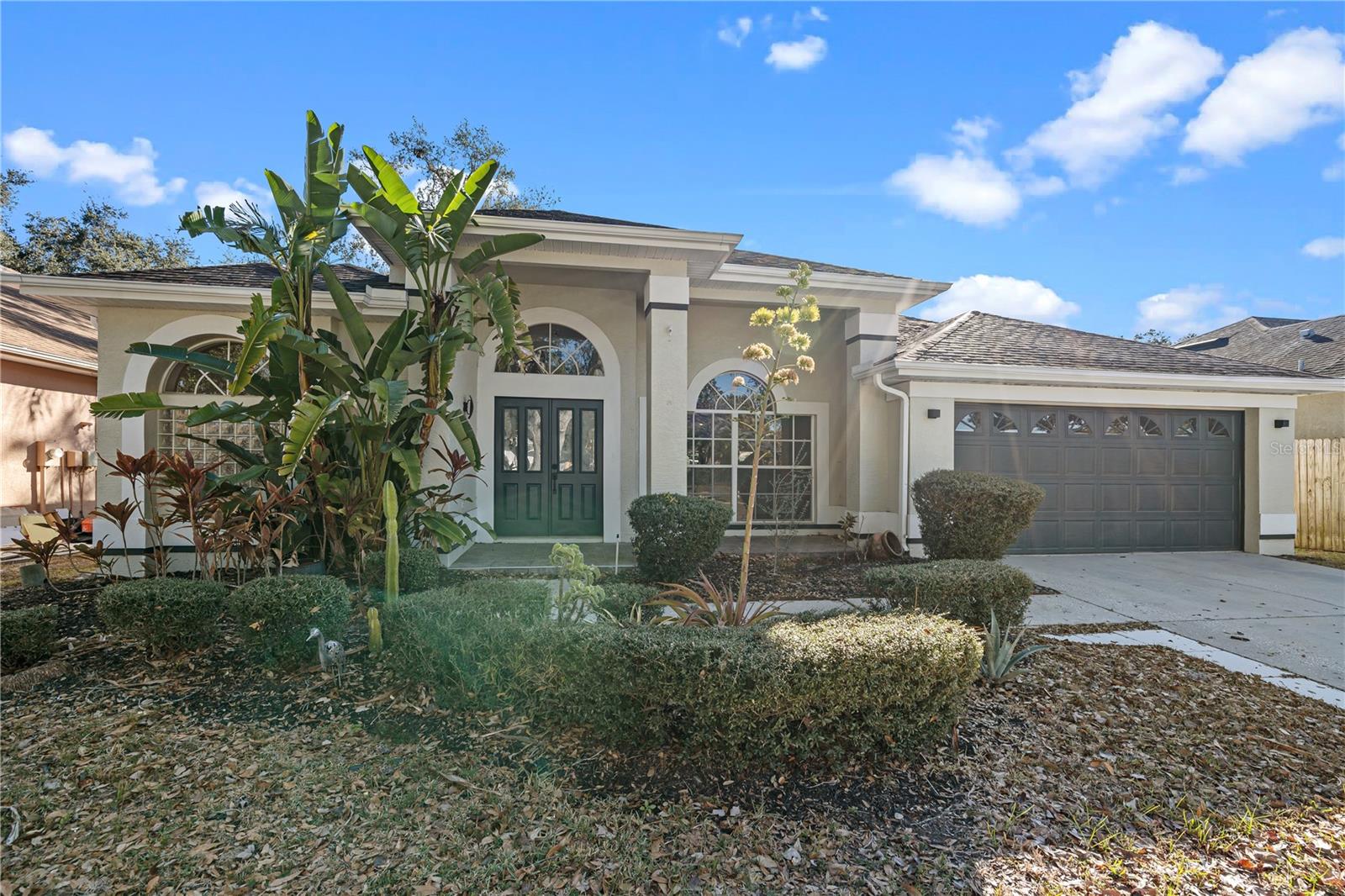Nestled in Carrollwood, this beautiful 4-bedroom, 3-bath home offers comfort, space, and effortless flow for modern living. The open floor plan creates a bright, inviting atmosphere, perfect for both everyday life and entertaining. A cozy fireplace adds warmth and charm, making the living area an ideal gathering spot. Generously sized bedrooms provide flexibility for family, guests, or a home office, while three full bathrooms ensure convenience for everyone. Located in an established neighborhood close to shopping, dining, and major roadways, this home blends timeless appeal with a layout designed for today’s lifestyle.