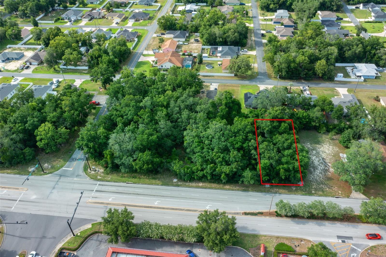SUPER LOCATION! This is a great Opportunity lot of 0.22 Acre 75 X 125 One of  the most important  Hwy 42 in Marion  the County of the Horses and the Beautiful Green  Farms in front to the Famous The Villages of Summerfield, Mulberry Recreation, Just 1 minute Publix, Shopping Centers, Restaurants, Supermarkets, many Jobs Opportunity, The famous The Villages Hospital, Good Schools and MUCH MORE...... Also is Available a land 0.22 next to That. Excellent opportunity to build two new homes on two adjacent residential lots ideally located on SE Hwy 42 in Summerfield, directly across from The Villages and near a Publix shopping plaza and gas station.
This high-visibility and fast-growing area offers strong demand for new construction, making it perfect for builders, investors, or future homeowners looking to develop in one of Central Florida's most desirable corridors.
Convenient access to shopping, dining, medical facilities, and major roadways. Positioned in a rapidly expanding residential zone surrounded by established communities and continuous development.
Build one home on each lot or secure both for a flexible investment strategy.
Don't miss this rare chance to own two buildable lots in a prime location across from The Villages.