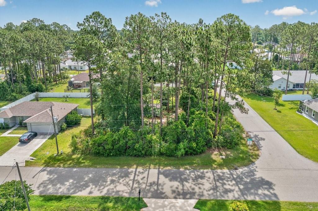 AMAZING CORNER LOT.......what a fantastic opportunity to build your dream home on a spacious 100 x 125 corner lot. This high-and-dry property is located in a great neighborhood close to schools, shopping, restaurants, and everyday conveniences.  The lot already features a shed and mature landscaping, giving you a head start on creating the perfect outdoor space and plenty of room for a pool. It’s a great canvas to construct your dream home and create the backyard oasis you’ve always wanted. Whether you are ready to build now or looking for a smart investment in Palm Coast, this property is a great find! Come and check it out for yourself.