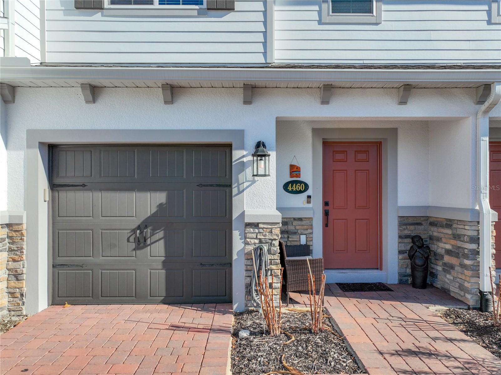 Experience the best of Lake Nona West living in this beautifully maintained 3-bedroom, 2.5-bath townhome, ideally located just off Boggy Creek Rd and Lake Nona Blvd. Enjoy an unbeatable location just minutes from Lake Nona West, Boxi Park, Orlando International Airport, UCF, major medical centers, the USTA National Campus, shopping, dining, and entertainment.

Inside, you'll find a bright open-concept floor plan featuring quartz countertops, white solid wood cabinetry, and a custom acoustic feature wall that adds both style and functionality to the living area. The spacious layout is perfect for everyday living, entertaining, or working from home (office space).

Enjoy the convenience of living in one of Orlando's fastest-growing communities with quick access to major highways and everything Lake Nona West has to offer. This move-in ready home combines modern finishes, comfort, and an exceptional location—making it the perfect place to call home.