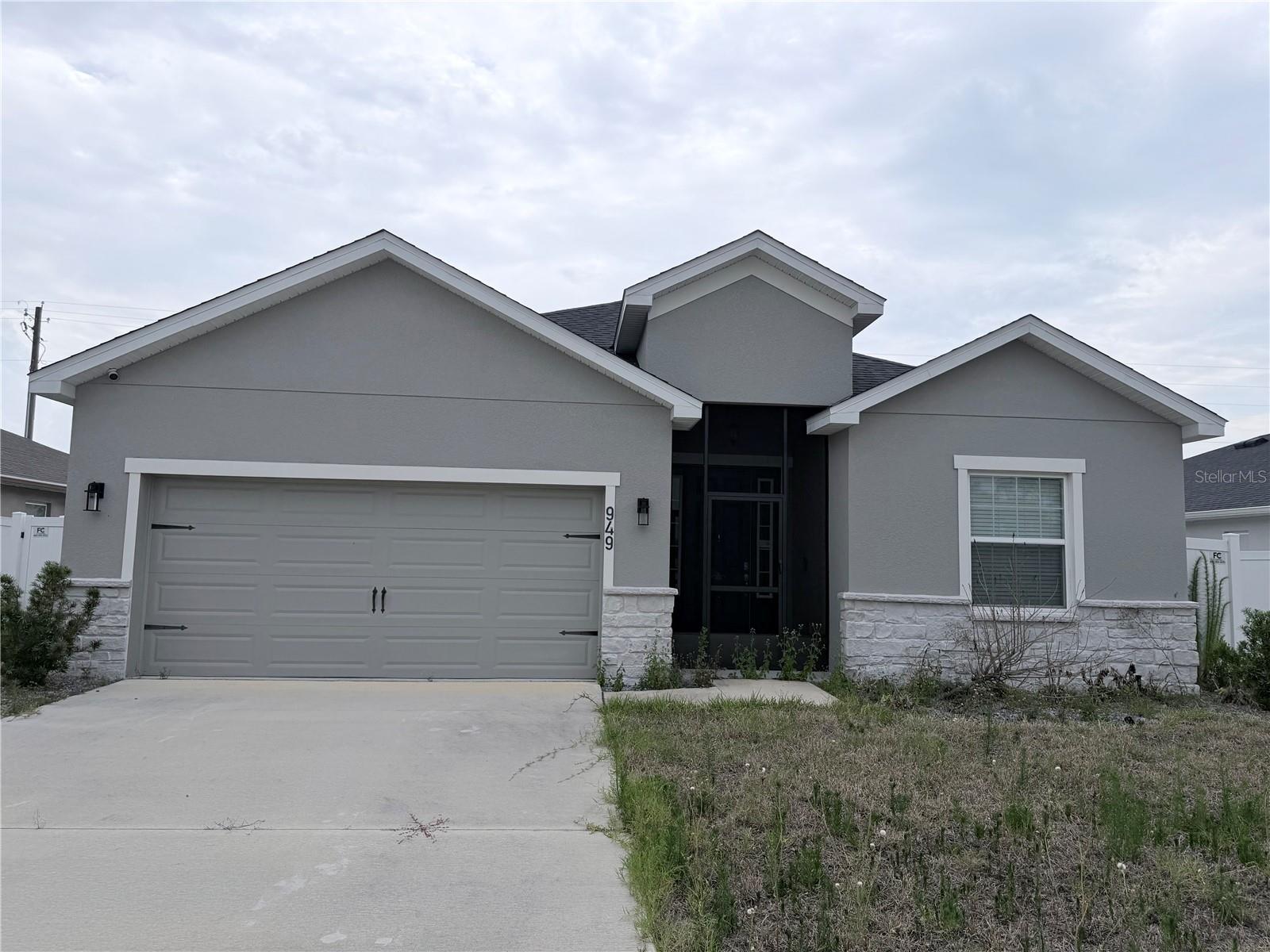 Short Sale. This 2023 built 2029 square feet, 4 bedroom, 2.5 bath home is perfect for a growing family.  It has an open living area, beautiful kitchen with stainless steel appliances, pantry, and a spacious counter height island, fully open to the dining and family room.  The living area, laundry room, and baths include luxury wood vinyl plank flooring, with stain-resistant carpet in the bedrooms. The owner's suite is complete with a walk-in wardrobe and a private en-suite bath with dual vanities, a tiled shower, and a closeted toilet. Enjoy an extended patio with elegant pavers, indoor laundry and 2-car garage.  Minutes from I-4 allowing access to Orlando, Lakeland, Tampa etc.