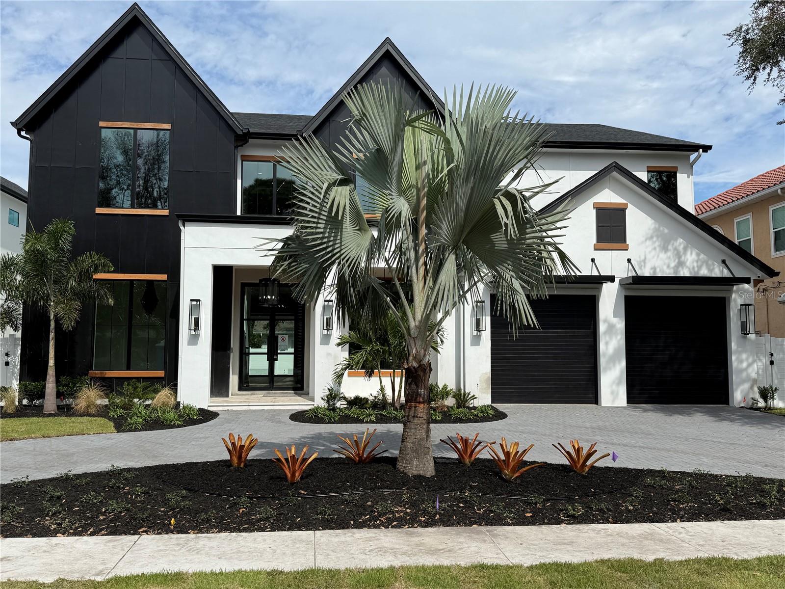 Pre-Construction. To be built. Welcome to the "Oak Hall" model by Luxury Home Builder, Taralon Homes! This custom home will sit on a beautiful tree lined street in sought after Bayshore Beautiful.  The home has 5,464 sf of living space which includes 5 ensuite bedrooms (one guest suite located on the first floor), 2 additional half baths, an office, both a downstairs bonus/flex room and an upstairs game room, an oversized 2 1/2 car garage plus, a beautiful, heated pool with spa.  There are custom luxury finishes throughout the home including a mahogany wood and iron front door, 2 story open foyer, stairway with oak treads and contemporary wood-stained handrails, 7 1/2 inch plank oak wood flooring, porcelain tile throughout the wet areas,  crown molding, 8 foot interior doors and soaring 11.4 foot ceilings on the first floor with 10 foot on the 2nd floor, custom built closets, gas fireplace, upgraded spray foam in the attic +++ so much more! The kitchen features your choice of stained or painted wood cabinetry, 42” upper cabinets with light rails, your choice of granite or quartz with island to have waterfall edge countertop, tile backsplash, built in full size Thermador refrigerator and full size Thermador freezer, 48 inch Thermador gas range with griddle and a custom 52 inch range hood, and wine chiller.  There is both a walk-in pantry and butler’s pantry adjoining the formal dining room with tiered ceiling.  Situated off the kitchen and grand living room is the large, covered lanai with tongue and groove painted ceiling, built in outdoor kitchen with gas grill all overlooking the gorgeous pool and spa and finished off with silver travertine pavers. MAKE YOUR CUSTOM SELECTIONS NOW to add your own personal touch!  Brochure with the floorplan and detail of the finishes is available.