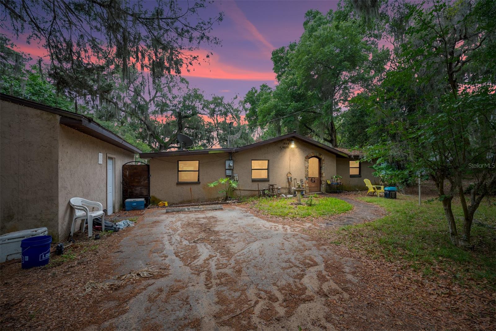 Welcome to this versatile and charming property offering the perfect blend of space and opportunity. The main 3-bedroom, 2-bathroom home is in great overall condition, complemented by a detached mother-in-law suite with its own living area and full bathroom ideal for extended family, guests, or rental income. A separate garage rounds out the property nicely. At 1,886 sq ft, the home features a 10-year AC, a 5-year water heater, and a roof that is 10–12 years old. Property runs on well water and septic was last pumped 8-years ago. FULL 3D walk-through link available upon request. PLEASE NOTE - I AM NOT AVAILABLE ON THE SABBATH/SATURDAY'S.