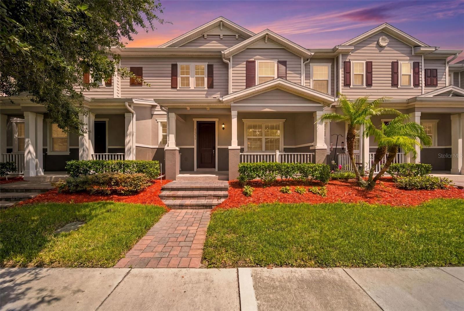 A Windermere address is more than a location—it is a lifestyle.
Welcome to 13736 Summerport Village Parkway, an opportunity to own in one of Central Florida's most desirable and enduring communities. Nestled within The Vineyards of Windermere, this elegant three-bedroom townhome offers the perfect blend of refined living, everyday convenience, and the prestige that continues to make the Windermere ZIP code one of the area's most sought-after destinations.
Designed for effortless living, the home welcomes you with an open-concept layout featuring laminate flooring throughout the main level, a beautifully appointed kitchen with PREMIUM GRANITE COUNTERTOPS, an elegant designer tile backsplash, UPGRADED STAINLESS STEEL APPLIANCES, and bright, inviting living spaces that transition seamlessly from everyday comfort to entertaining. Just beyond the kitchen, sliding glass doors open to a PRIVATE FENCED PATIO—the perfect setting to enjoy your morning coffee, an al fresco breakfast, or unwind at the end of the day while filling the home with an abundance of natural light. Adding even greater peace of mind, the ROOF WAS REPLACED IN 2025, offering lasting value for years to come.
Life here extends well beyond your front door. Residents enjoy beautifully maintained amenities including TWO RESORT-STYLE POOLS, A PLAYGROUND, AND A DOG PARK, all within a community known for its walkability and welcoming atmosphere. Everyday essentials are just a short stroll away, allowing you to enjoy the rare convenience of shopping, dining, and neighborhood services without leaving your community.
One of the greatest advantages of this home is its exceptional location. Situated in the coveted Windermere area, you'll enjoy close proximity to TOP-RATED ORANGE COUNTY PUBLIC SCHOOLS, the vibrant Hamlin Town Center, Winter Garden Village, world-renowned theme parks, championship golf courses, and an impressive collection of restaurants, cafés, fitness studios, and outdoor recreation. Easy access to major highways places Downtown Orlando, Orlando International Airport, and Central Florida's premier destinations within comfortable reach.
Whether you're looking for a primary residence or a long-term investment in one of the region's strongest real estate markets, this home represents an opportunity to secure both lifestyle and lasting value in a location where demand continues to remain exceptionally strong.
Experience the charm, convenience, and timeless appeal that have made Windermere one of Central Florida's most coveted places to call home.