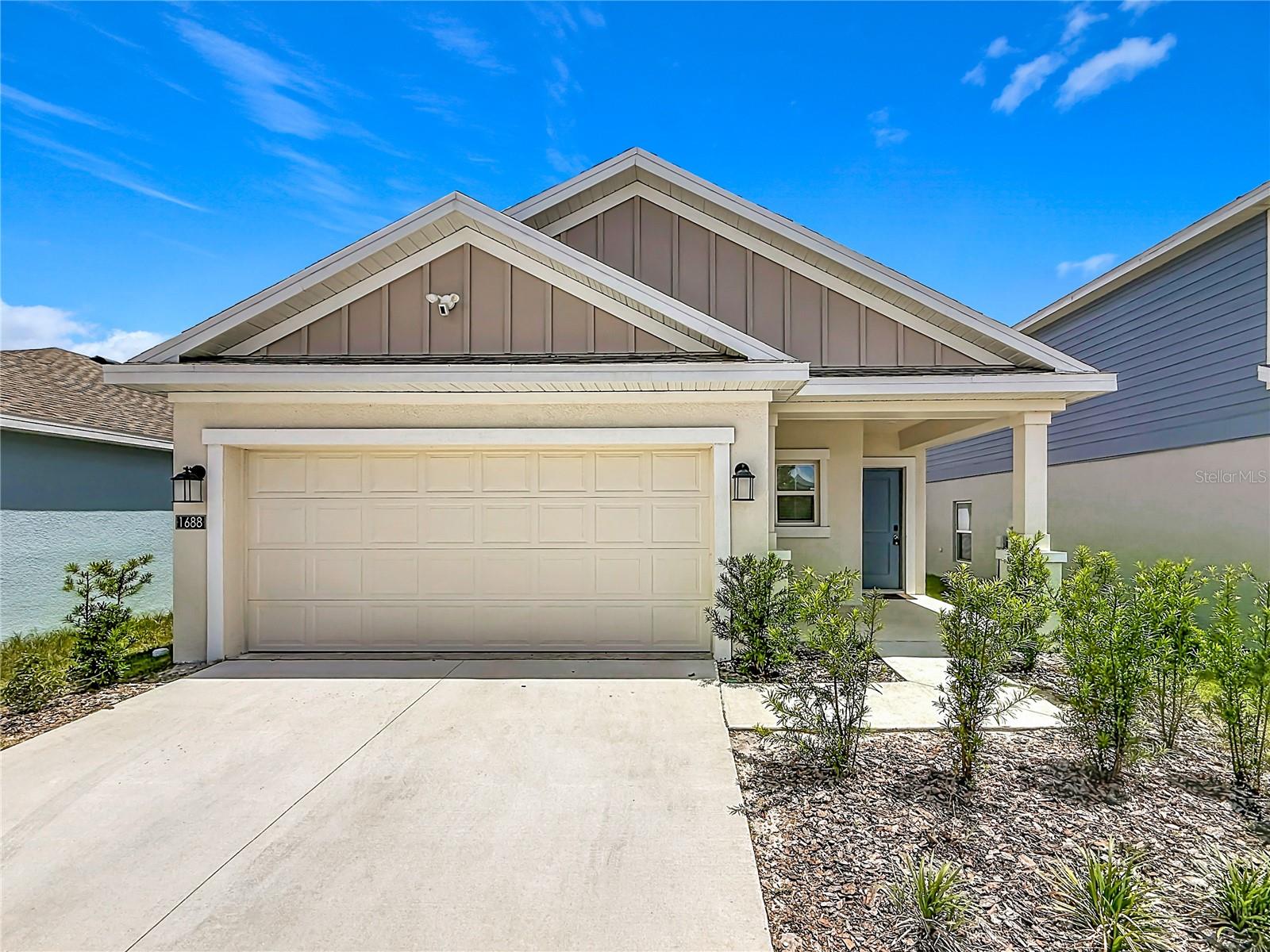 Welcome to easy Florida living in the sought-after community of Peace Creek Reserve in Winter Haven! Built in 2024, this beautifully designed 3-bedroom home offers a modern split-bedroom layout, stylish finishes, and comfortable open living spaces perfect for both relaxing and entertaining.

Step inside to discover bright and airy living areas with durable tile flooring flowing throughout the main spaces. The stunning kitchen is the heart of the home, featuring sleek stainless steel appliances, a large center island with seating space, abundant cabinetry, and an open design that overlooks both the dining area and spacious living room—making it easy to stay connected while hosting family and friends.

Tucked away at the back of the home for added privacy, the primary suite offers a peaceful retreat with a generously sized bedroom, private ensuite bath with dual sink vanity, and a custom walk-in closet designed for organization and convenience.

The split floor plan places the additional bedrooms and secondary bath on the opposite side of the home, creating flexibility for guests, family members, or a home office setup. Thoughtfully designed with newer construction benefits in mind, this home offers modern efficiency, low-maintenance living, and the peace of mind that comes with a recently built home.

Peace Creek Reserve offers a convenient Winter Haven location close to shopping, dining, parks, lakes, and everyday essentials, while also providing easy access for commuting throughout Central Florida. Enjoy nearby outdoor recreation, local attractions, and all the charm that Winter Haven living has to offer.

Whether you are looking for your first home, downsizing, or simply ready for a newer home with modern style and functionality, this one is ready to welcome you home. Schedule your private showing today!