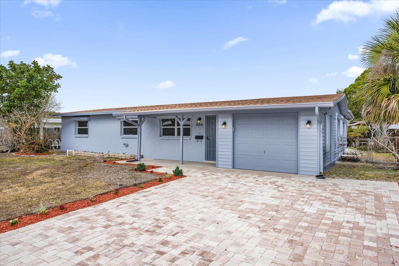 NEW GREAT PRICE. Welcome to this move in ready home. This home has been entirely remodeled with many new features and a lot of open space. This property comes with a brand new kitchen with quartz counter top and appliances. Also it has been upgraded with a new roof, new porcelain floor tiles, new master and guest Bathroom with new light feature, new Light features with integrated Fans, New sliding doors, fresh coat of paint inside and outside and new paver driveway. NEW RE-PIPING OF THE ENTIRE HOUSE. The pool have been recondition with new fresh painted deck. This property has a well pump for the sprinkler system. A must see.
