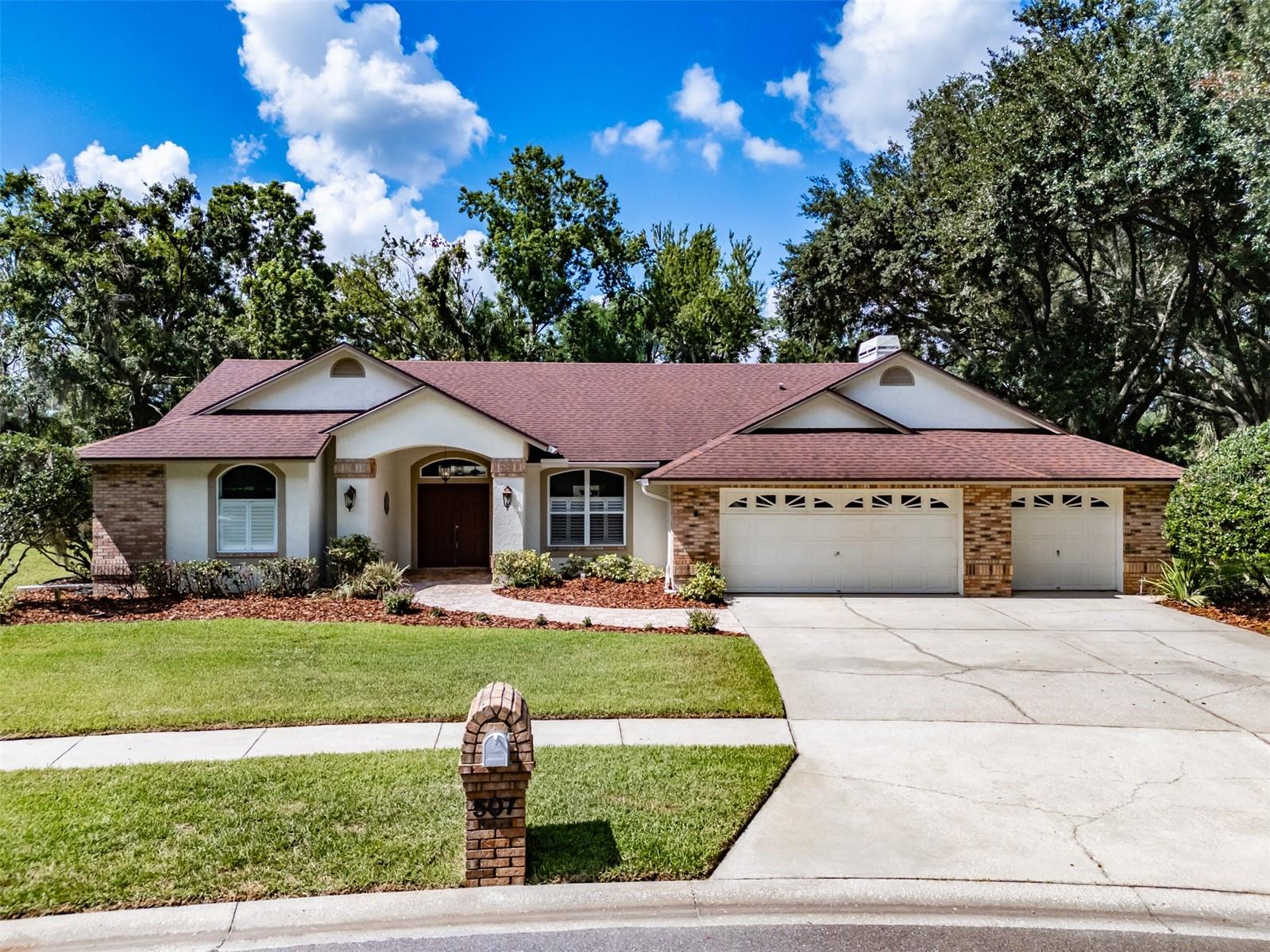 This spacious 4-bedroom, 2-bath pool home is located in the charming Surrey Chase neighborhood on a beautiful half-acre lot with no direct backyard neighbors. The kitchen offers abundant cabinetry, granite countertops, stainless steel appliances, pendant lighting, and a breakfast bar for casual dining. The roomy kitchen nook features glass sliders that open to the pool and lanai. The formal dining room includes plantation shutters and overlooks the front yard, while the formal living room features crown moulding and triple glass sliders leading to the lanai. The family room boasts a cozy wood-burning fireplace with brick surround, a vaulted ceiling, and opens to the kitchen. The large primary suite offers crown moulding, two walk-in closets, and glass sliders overlooking the pool. The en-suite bath features dual sinks, a soaking tub, and a frameless glass walk-in shower. The secondary bedrooms are spacious, and the large laundry room includes a utility sink plus extra space perfect for crafting, storage, or a hobby area. Designed for entertaining, this home offers multiple glass sliders, a screen-enclosed lanai, and an oversized pool overlooking a private, park-like backyard oasis filled with lush landscaping and mature shade trees. Additional features include custom attic shelving for extra storage. Conveniently located near shopping, dining, and US-41.